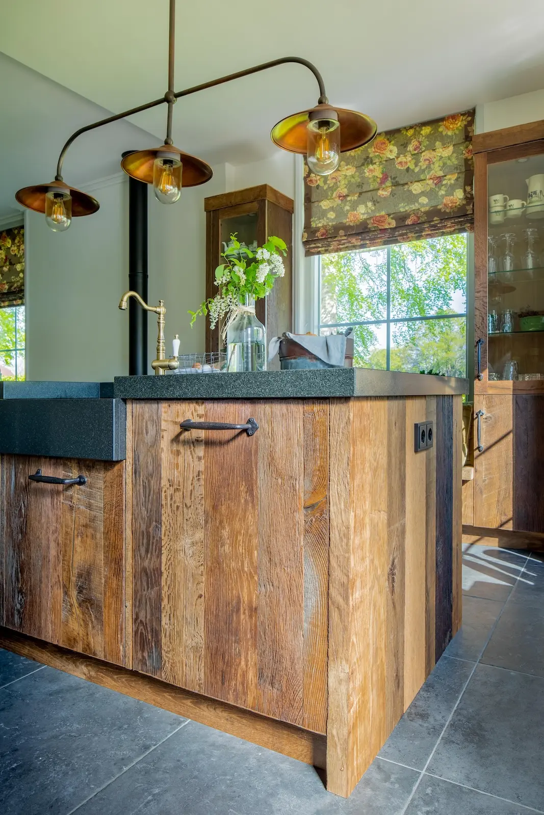 Rustic oak kitchen cabinets with visible grain patterns and handcrafted finish