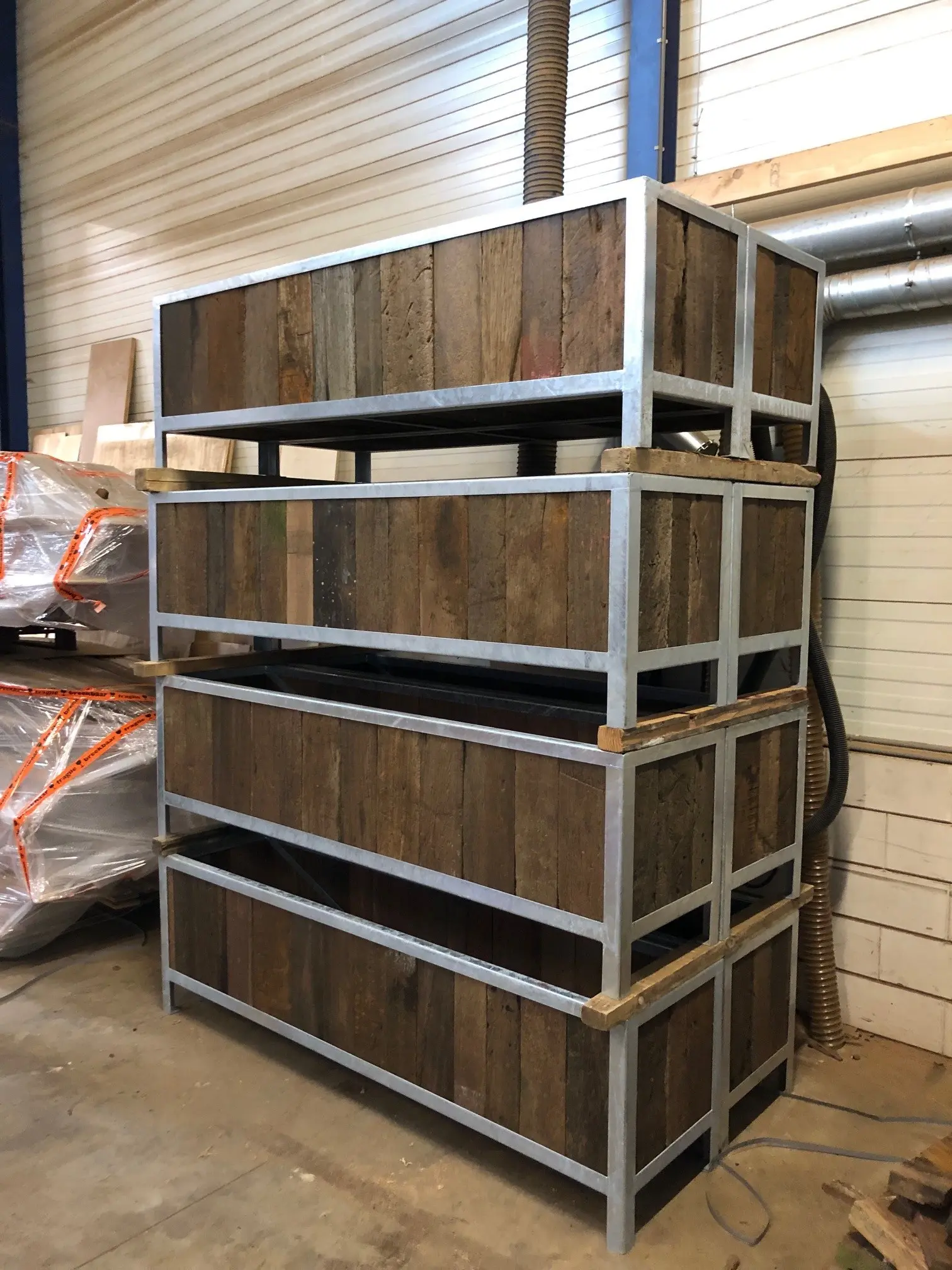 Rustic reclaimed timber cladding with natural grain patterns and weathered wood tones