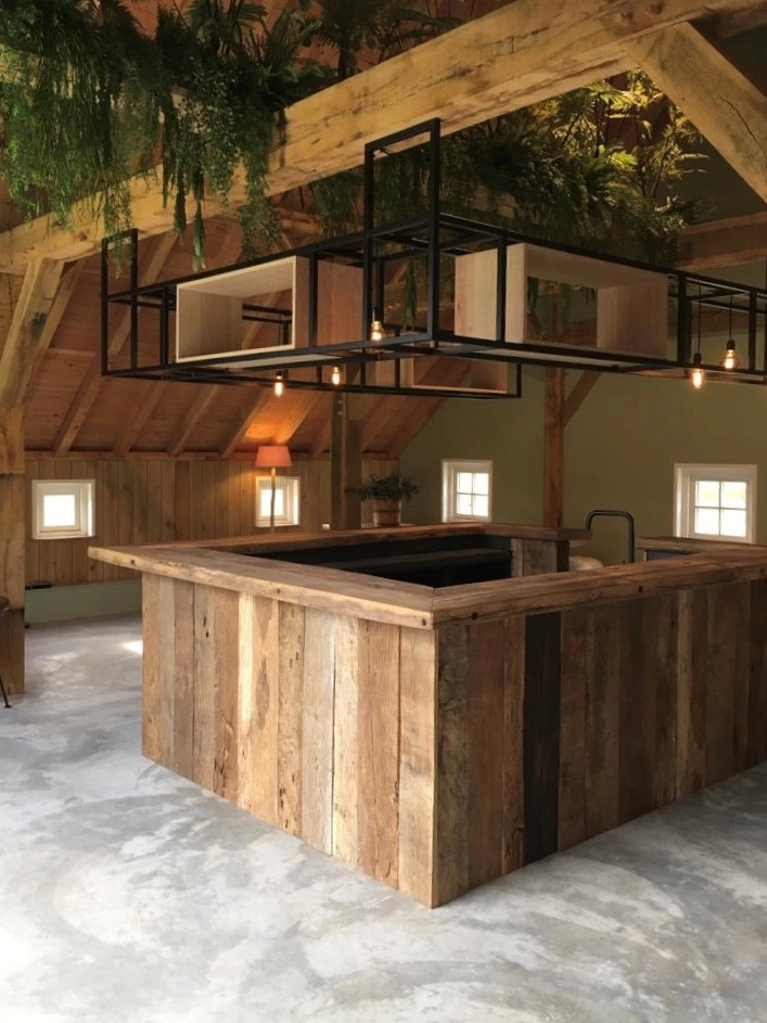 Rustic barnwood wood kitchen island with authentic reclaimed wood textures and warm natural tones