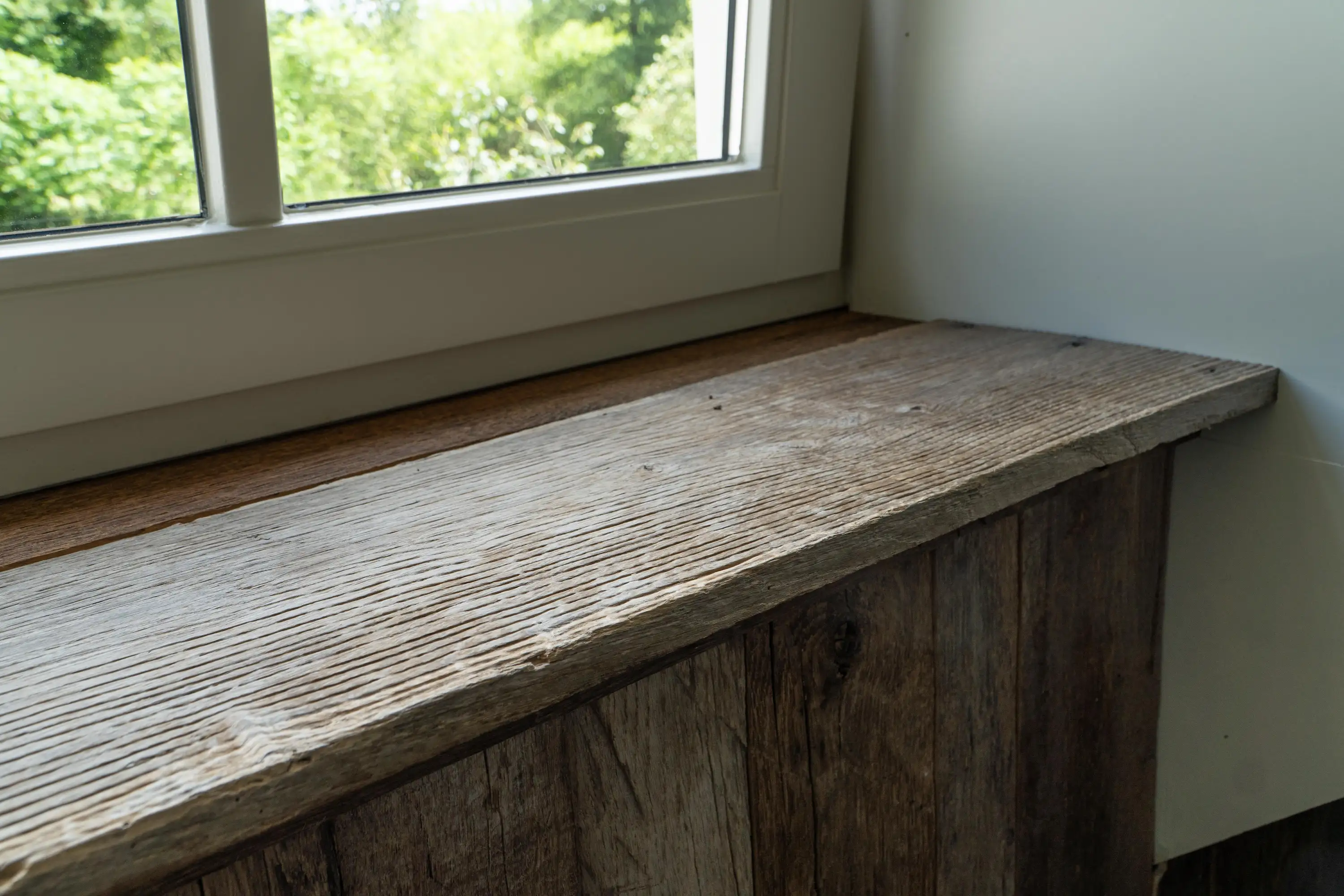 Aged oak window sills with timeless rustic charm and natural handcrafted details