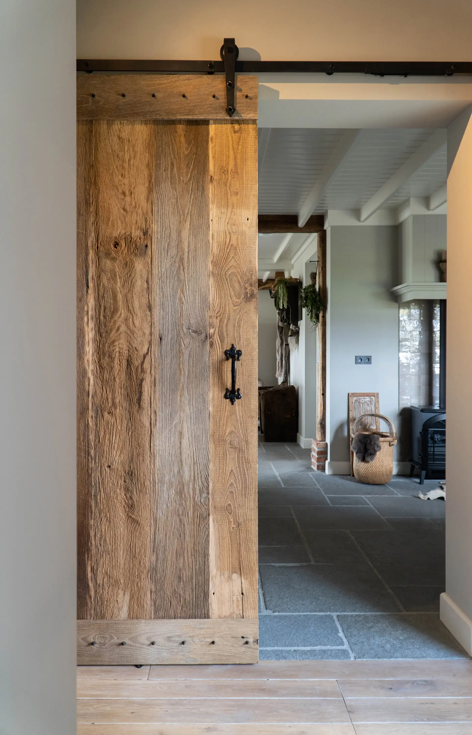 Oak barnwood loft door with rustic reclaimed wood textures and authentic aged appearance