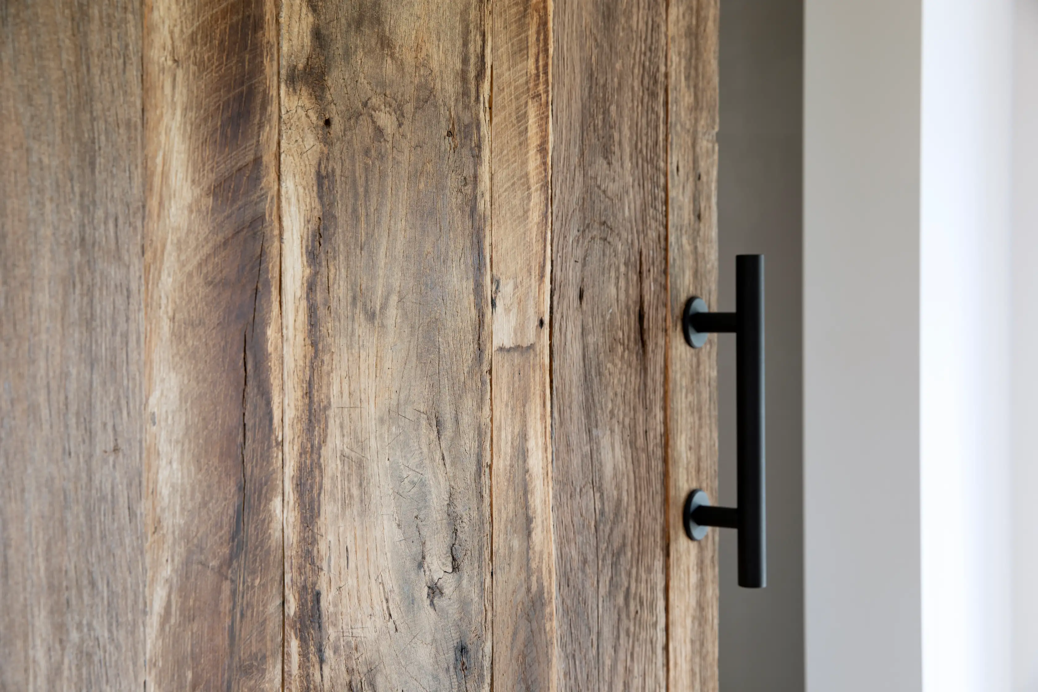 Handcrafted reclaimed wood barn door designed for modern rustic spaces