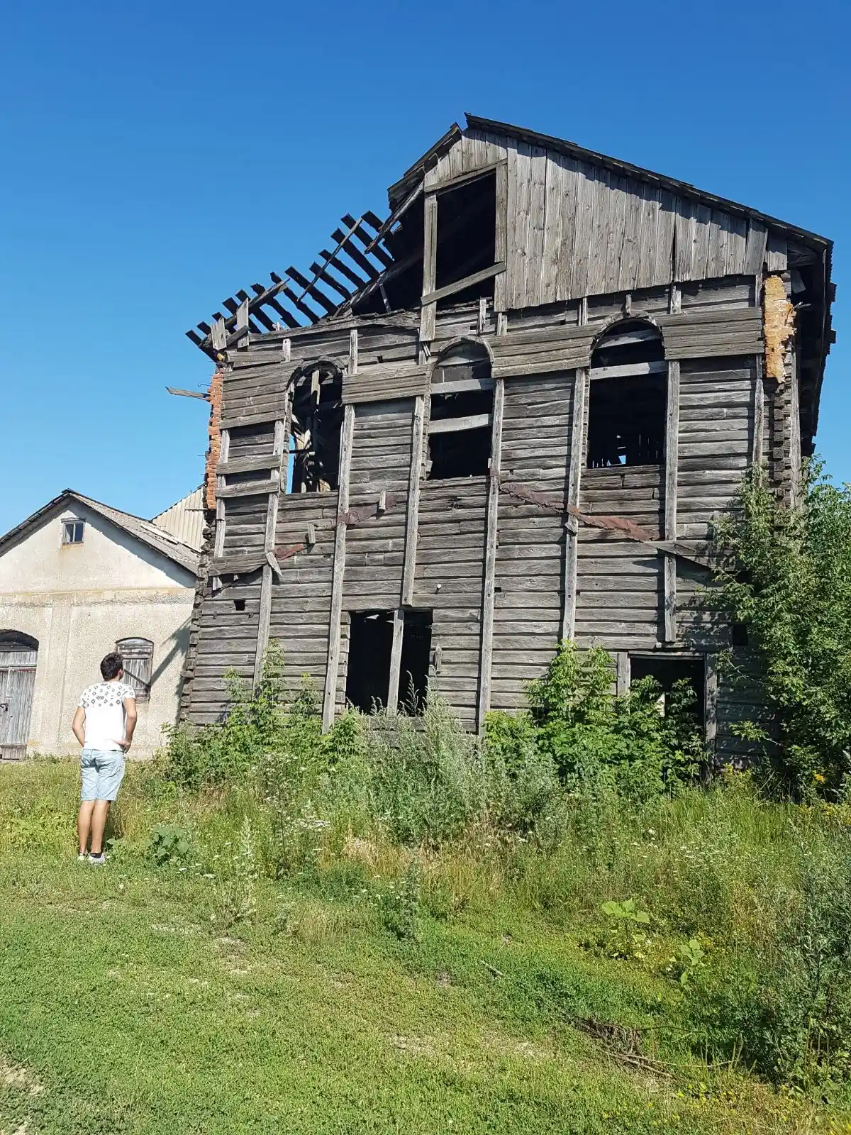 Historic barn structure made from reclaimed timber with authentic aged wooden planks