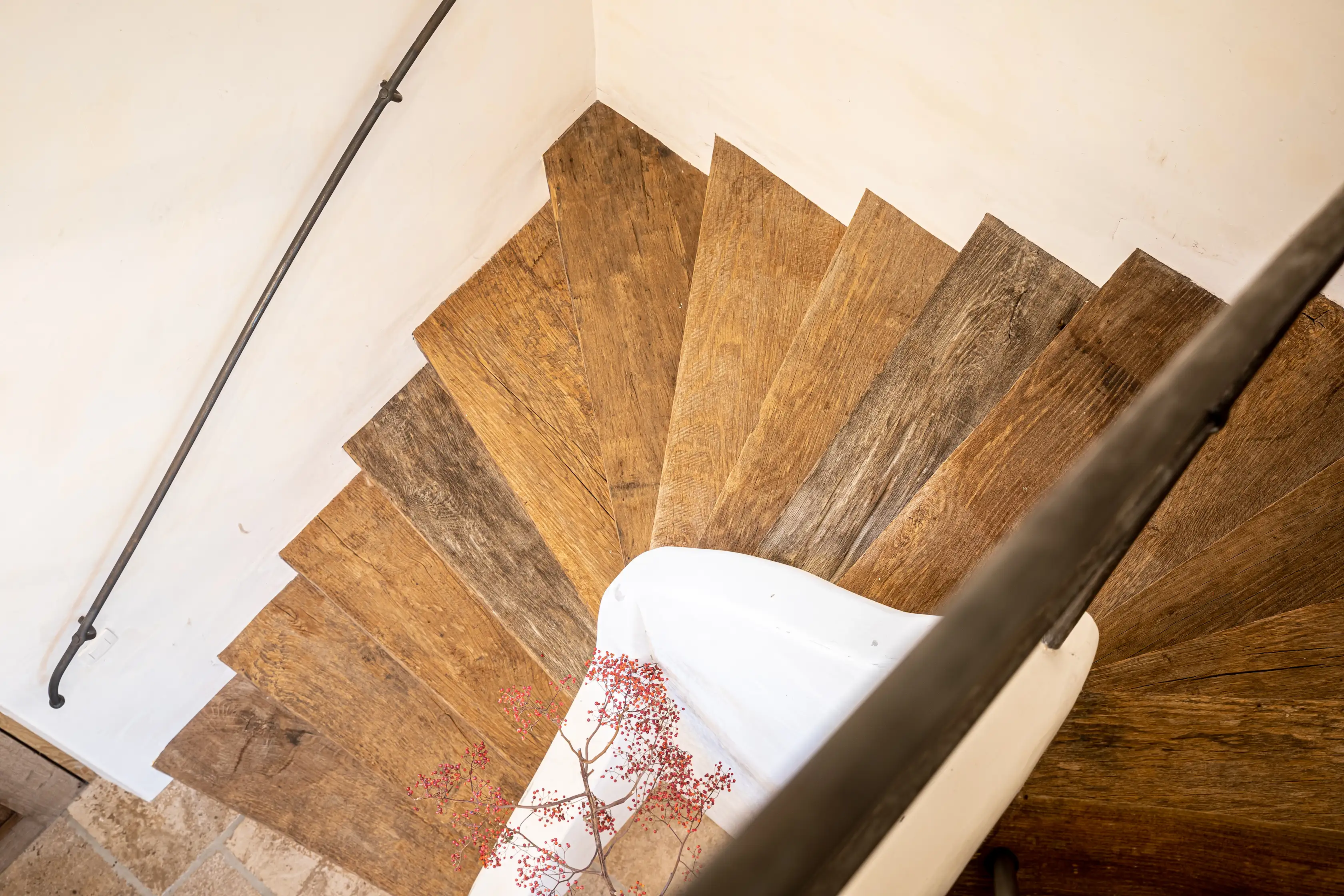 Reclaimed wood staircase with natural texture and aged wood character