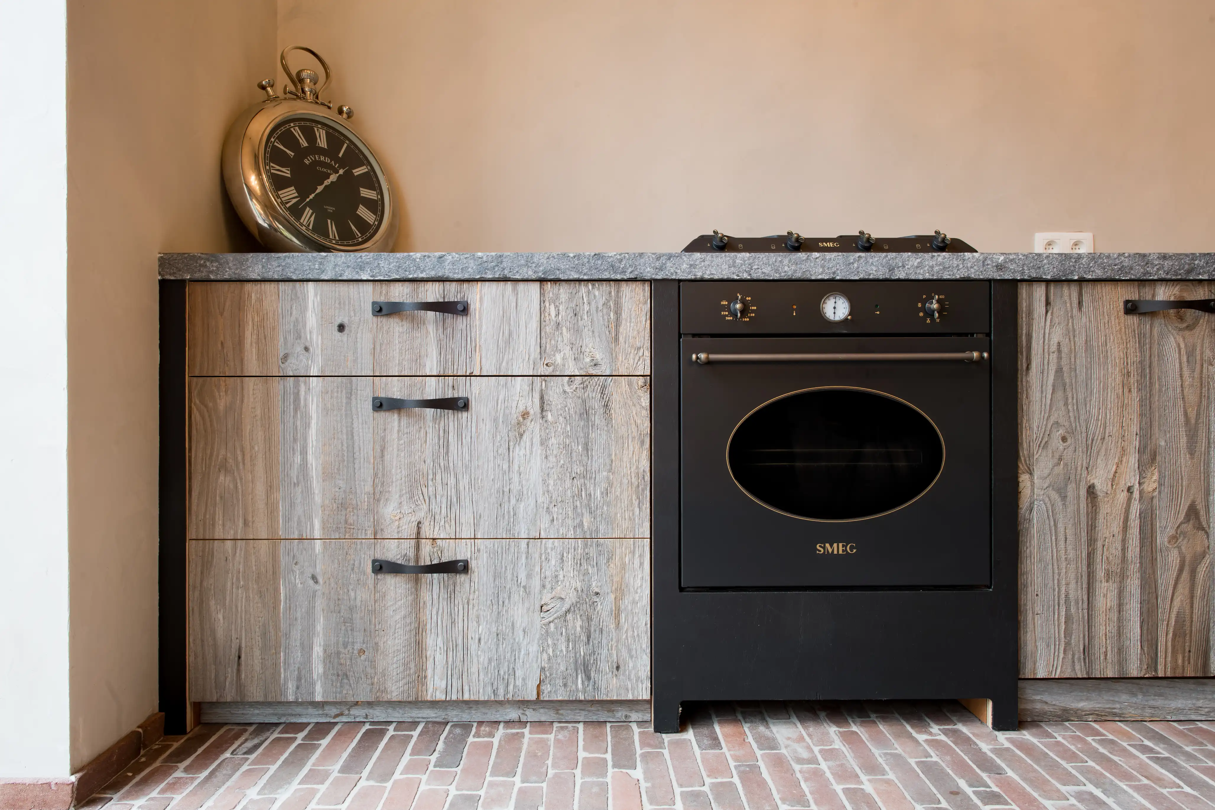 Oak kitchen with natural wood cabinets and warm rustic interior styling