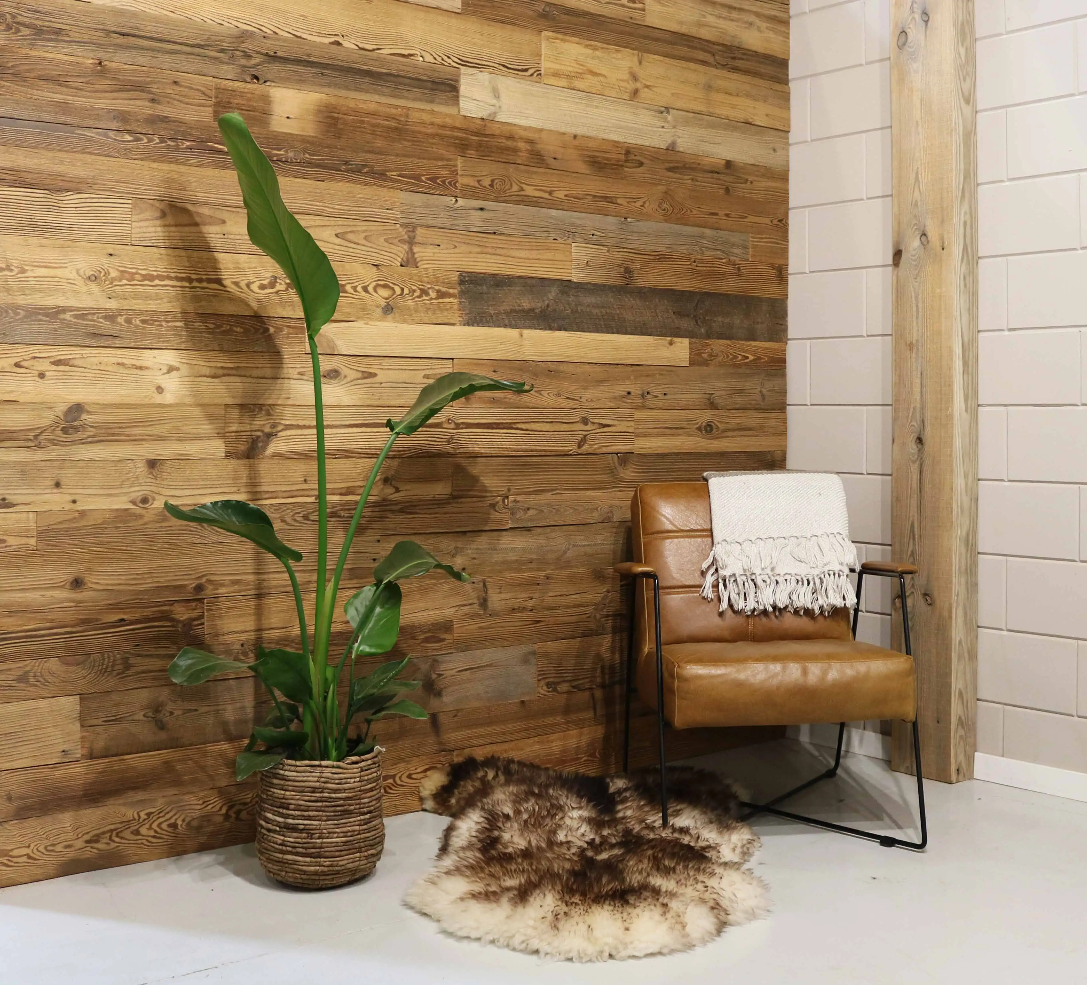 Alpine wood wall covering creating a warm and cozy mountain style interior atmosphere