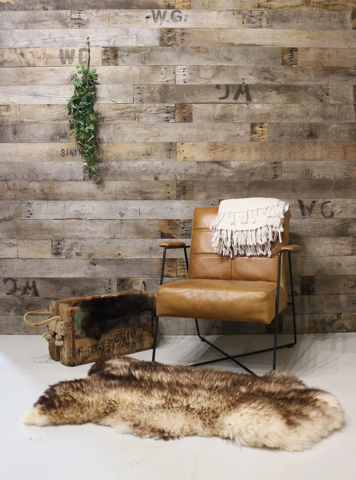 Wall covered with reclaimed wood panels showing texture and variation