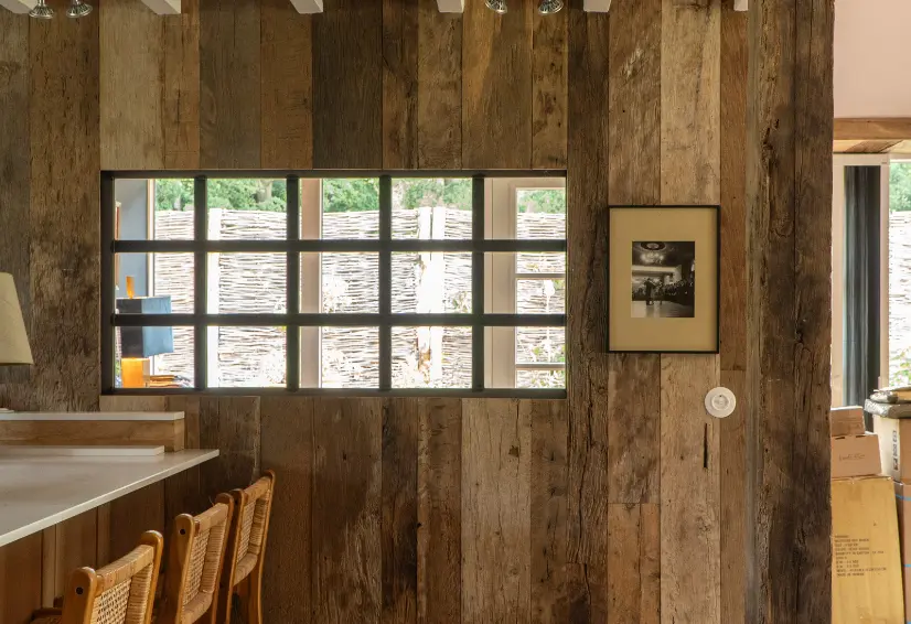 High quality reclaimed wood paneling with unique grain patterns and authentic reclaimed wood appearance