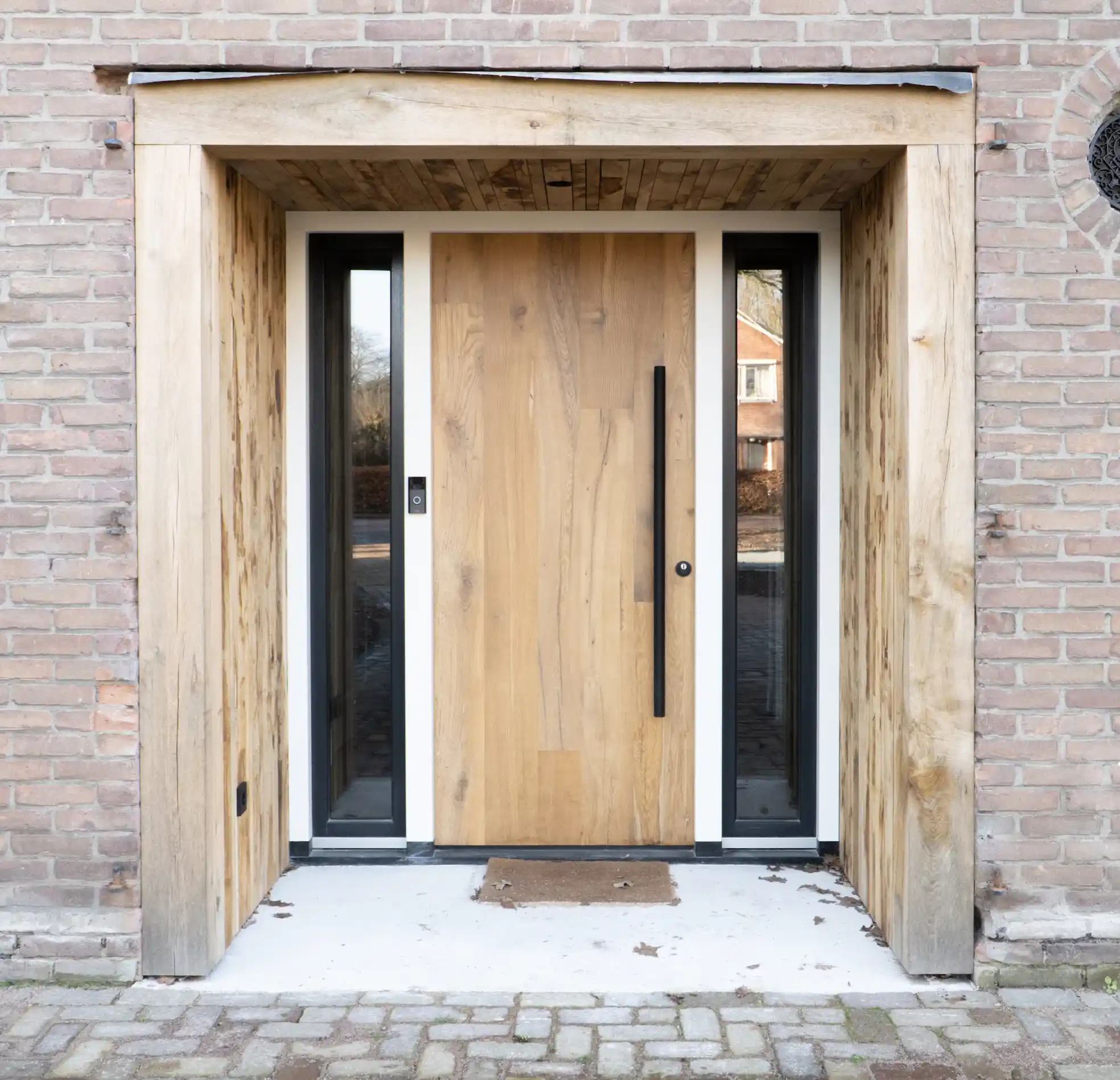 Reclaimed wood door with unique textures and aged finish