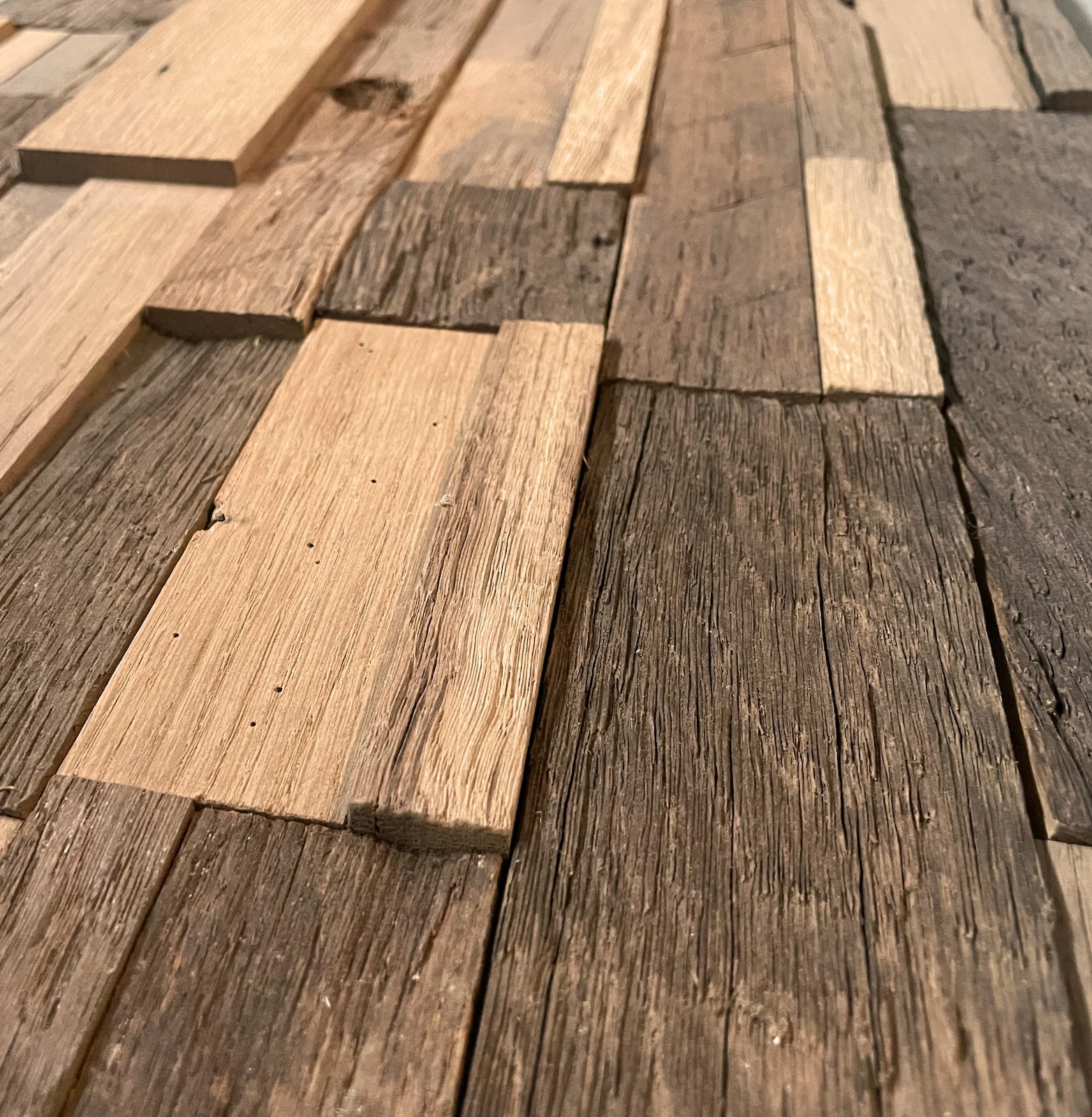 Reclaimed oak wood with weathered surface and rich texture