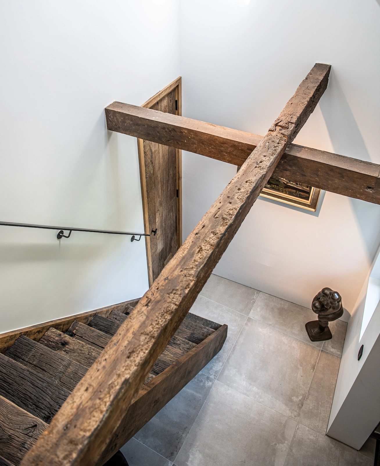 Reclaimed oak beams with natural imperfections and aged finish