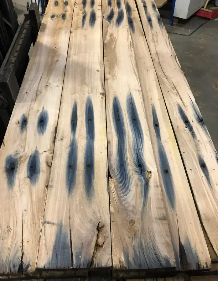 Wooden railway planks with visible grain and aged surface
