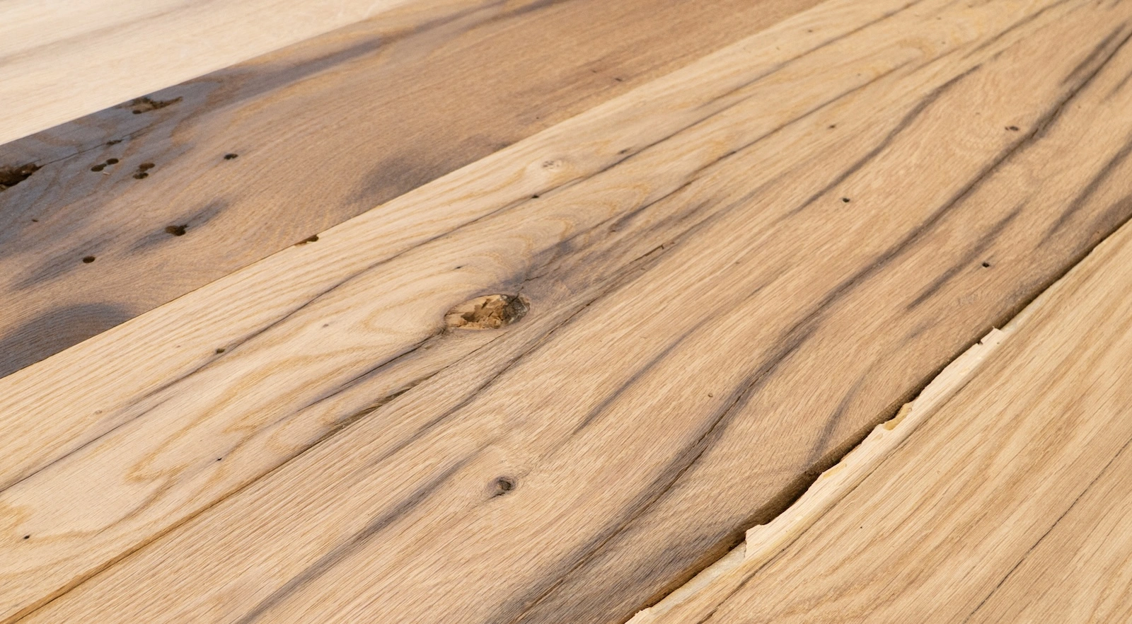 Old oak timber with visible cracks knots and natural character
