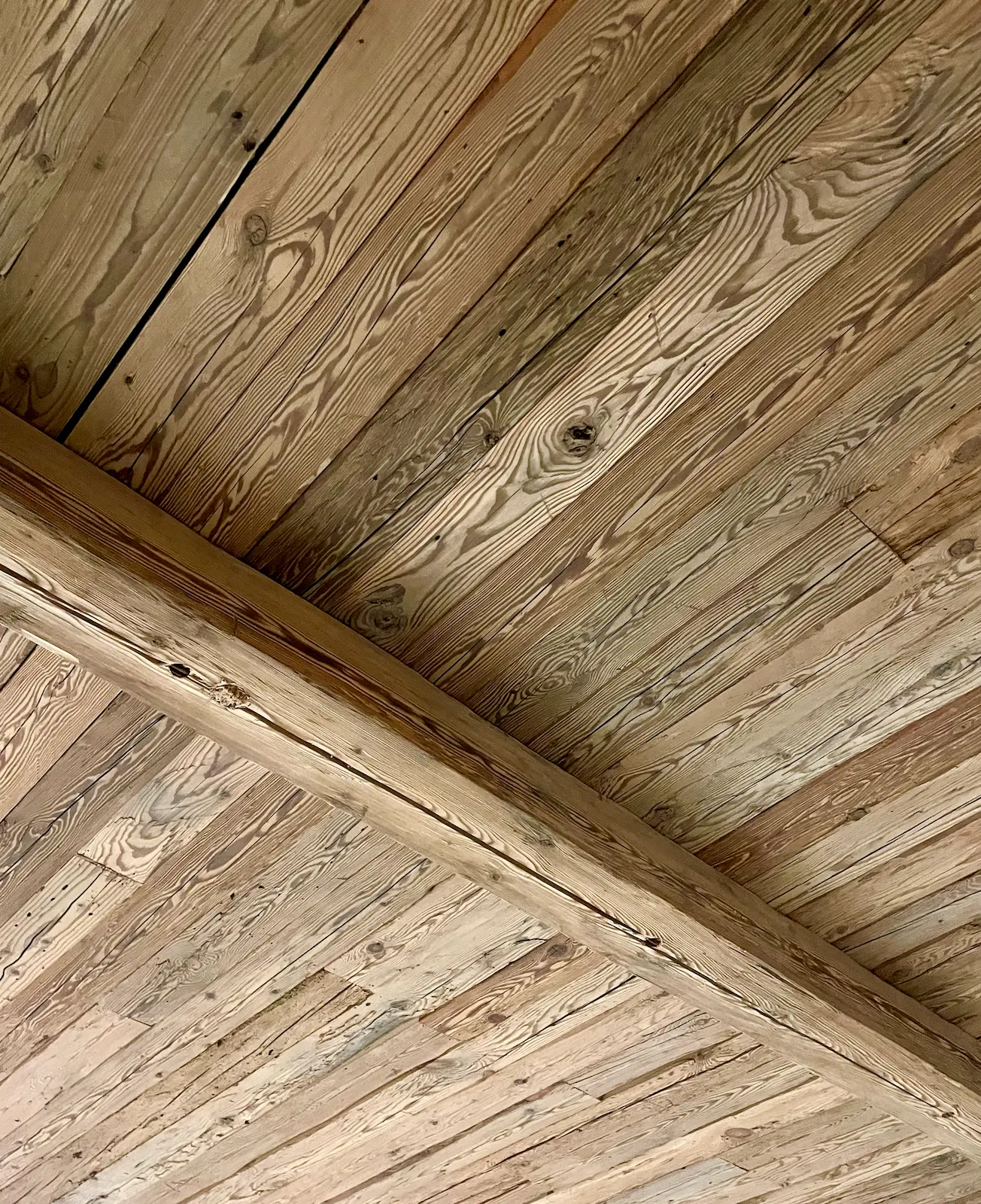 Oak wood surface with natural imperfections and rich texture