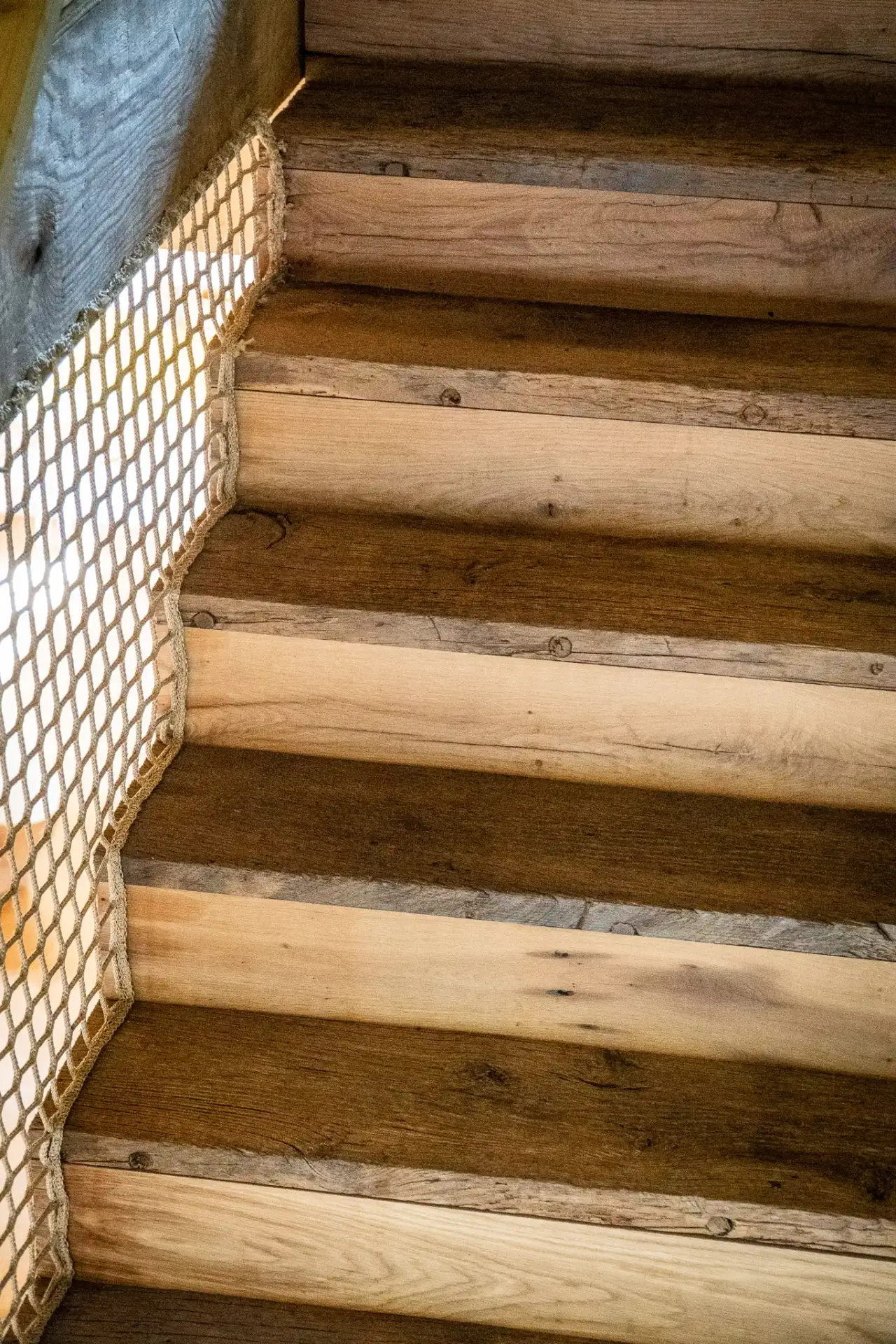 Premium old oak staircase with warm wood tones and natural texture.