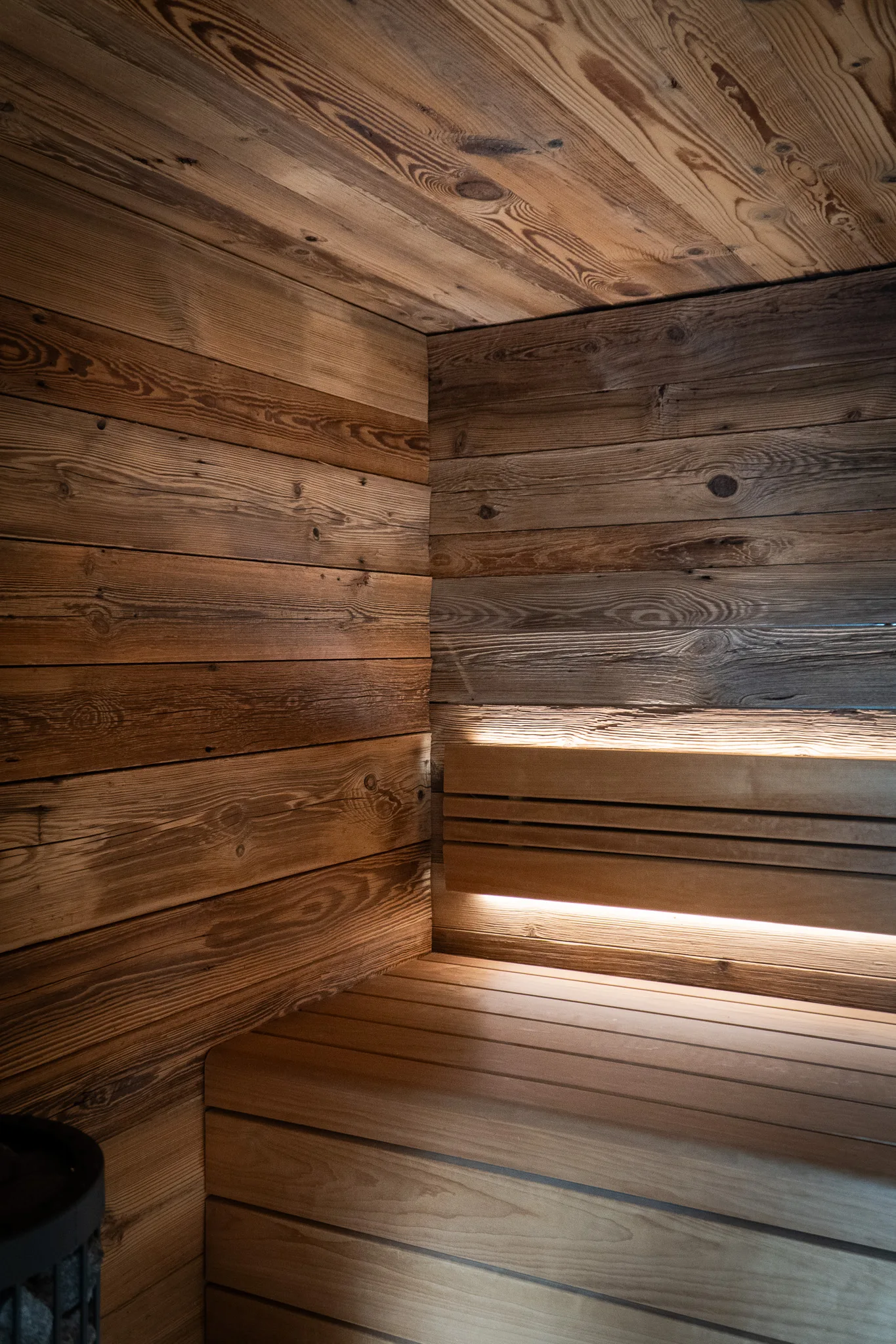 Wall covered with horizontal wooden planks and natural grain texture