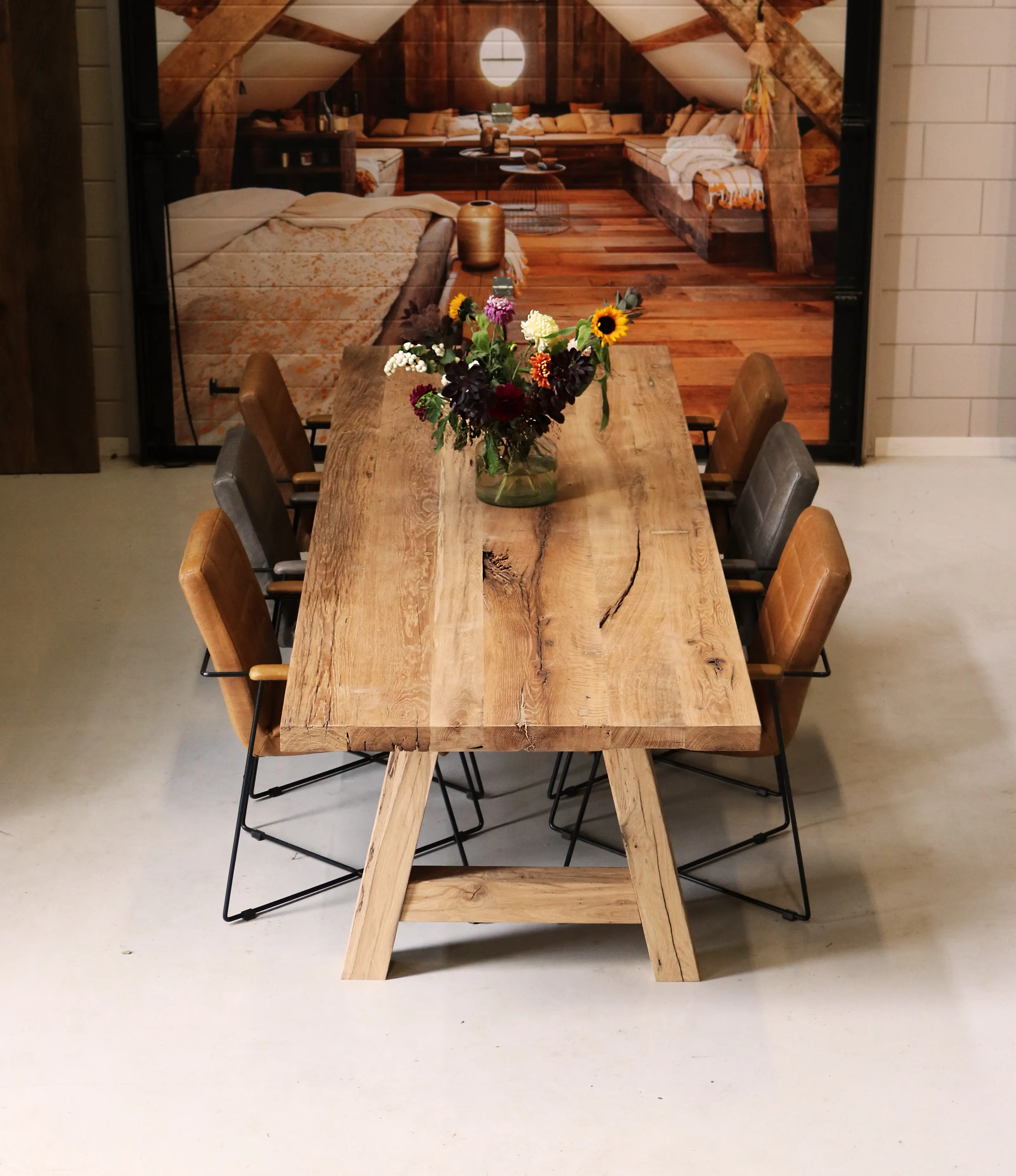 Decorative reclaimed oak dining table with authentic rustic appearance.