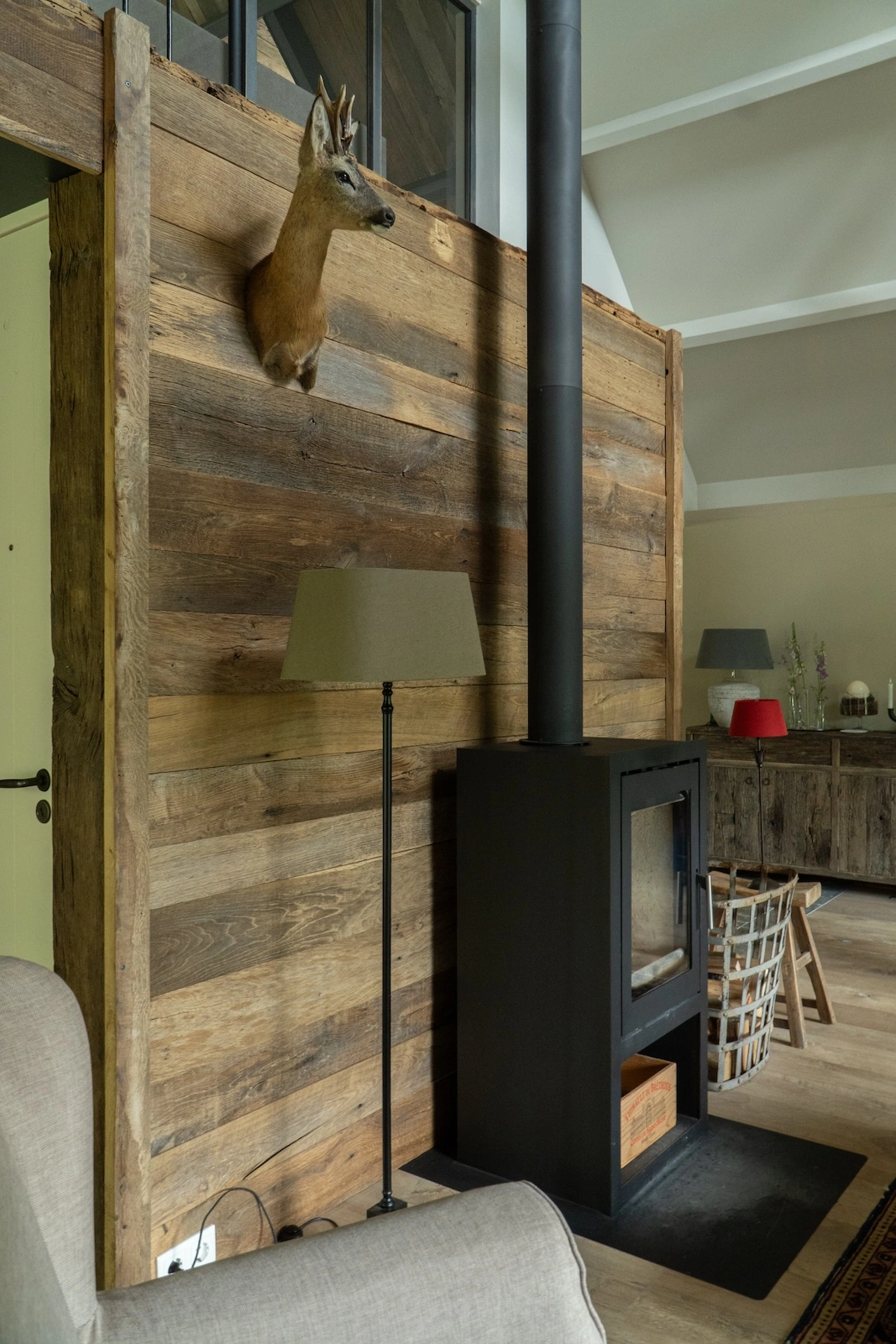 Wall covered with reclaimed oak boards and clean finish