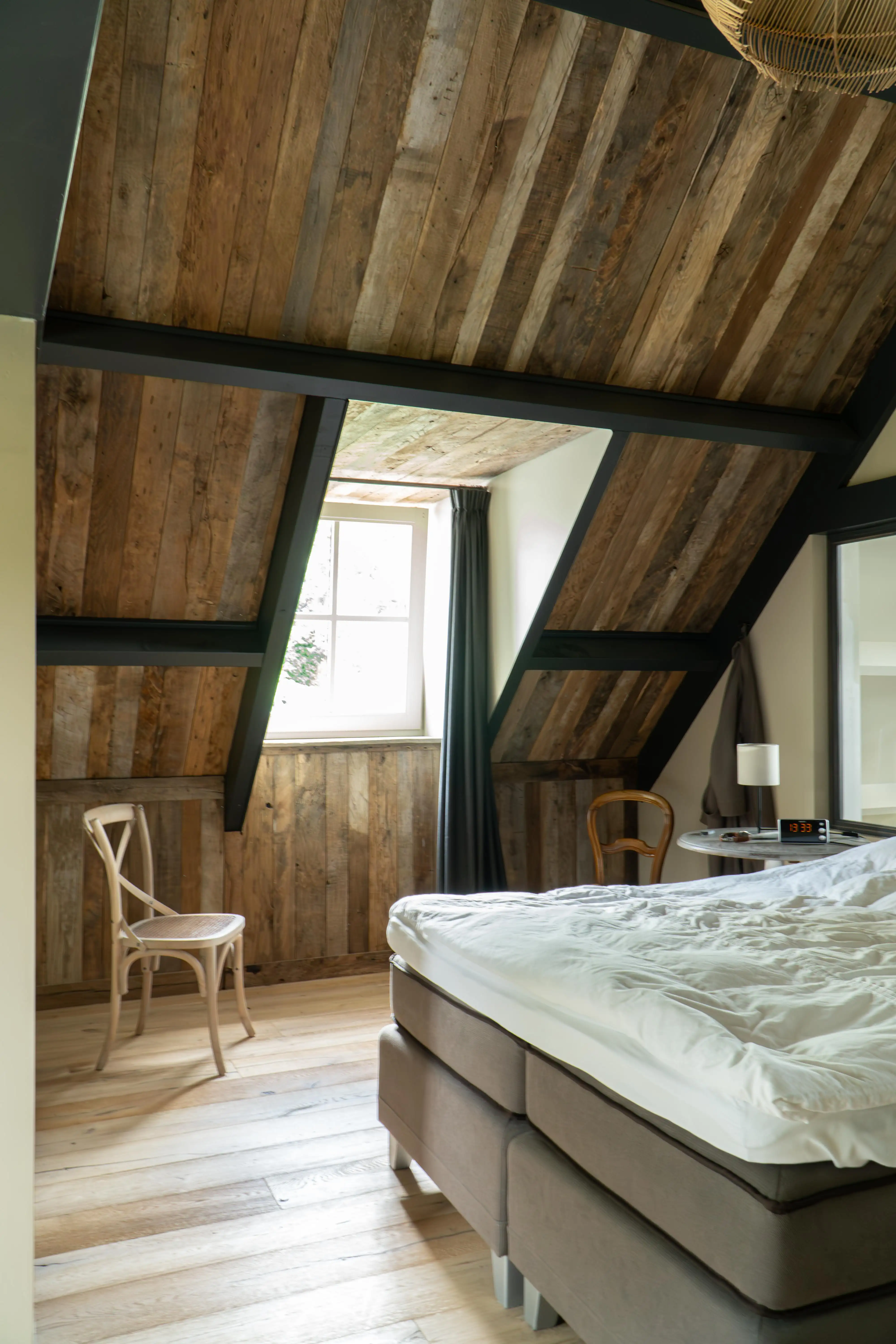 Barnwood wall panels made from reclaimed timber with weathered wood grain and rustic character