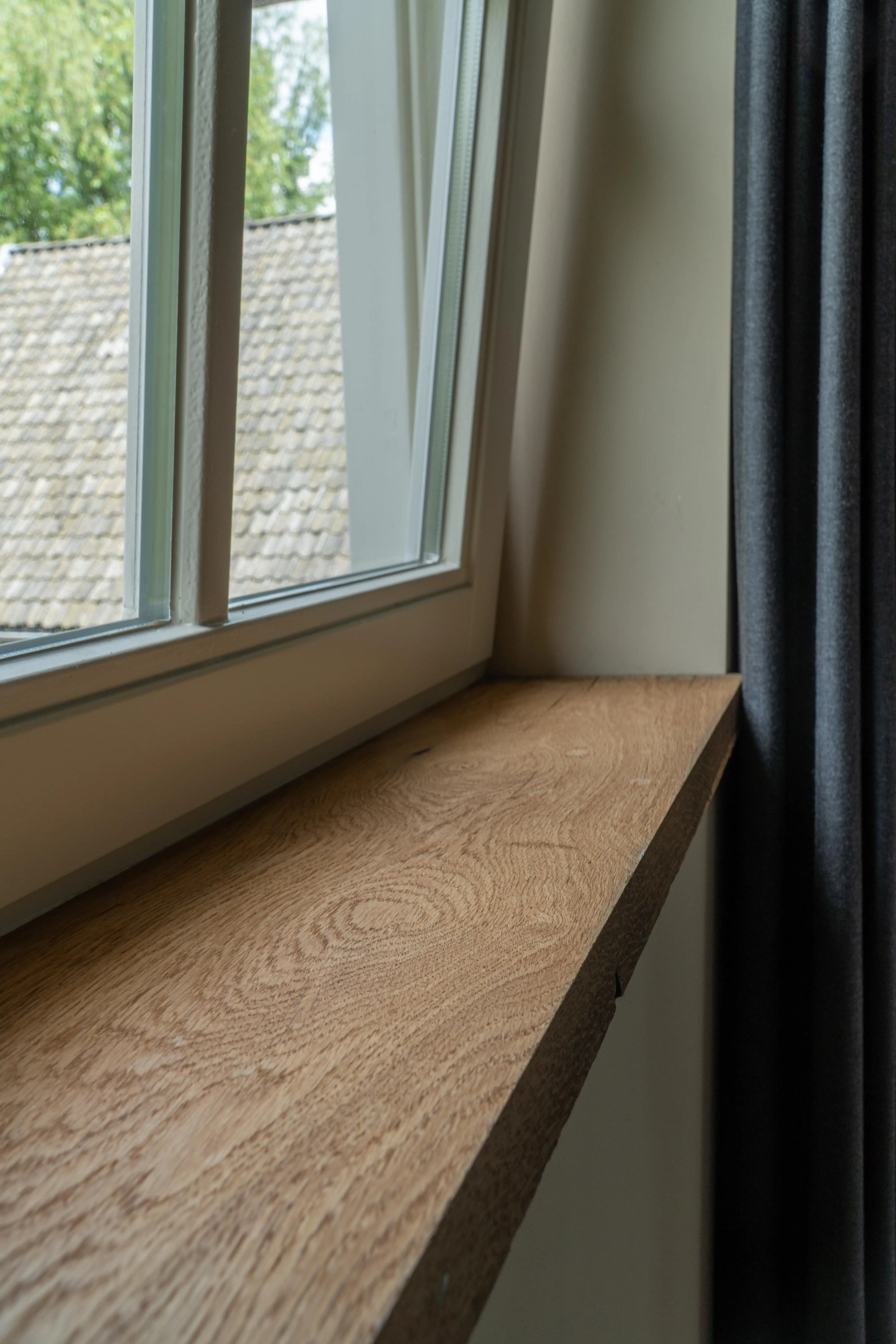 Durable aged oak window sill with handcrafted appearance and authentic wood structure
