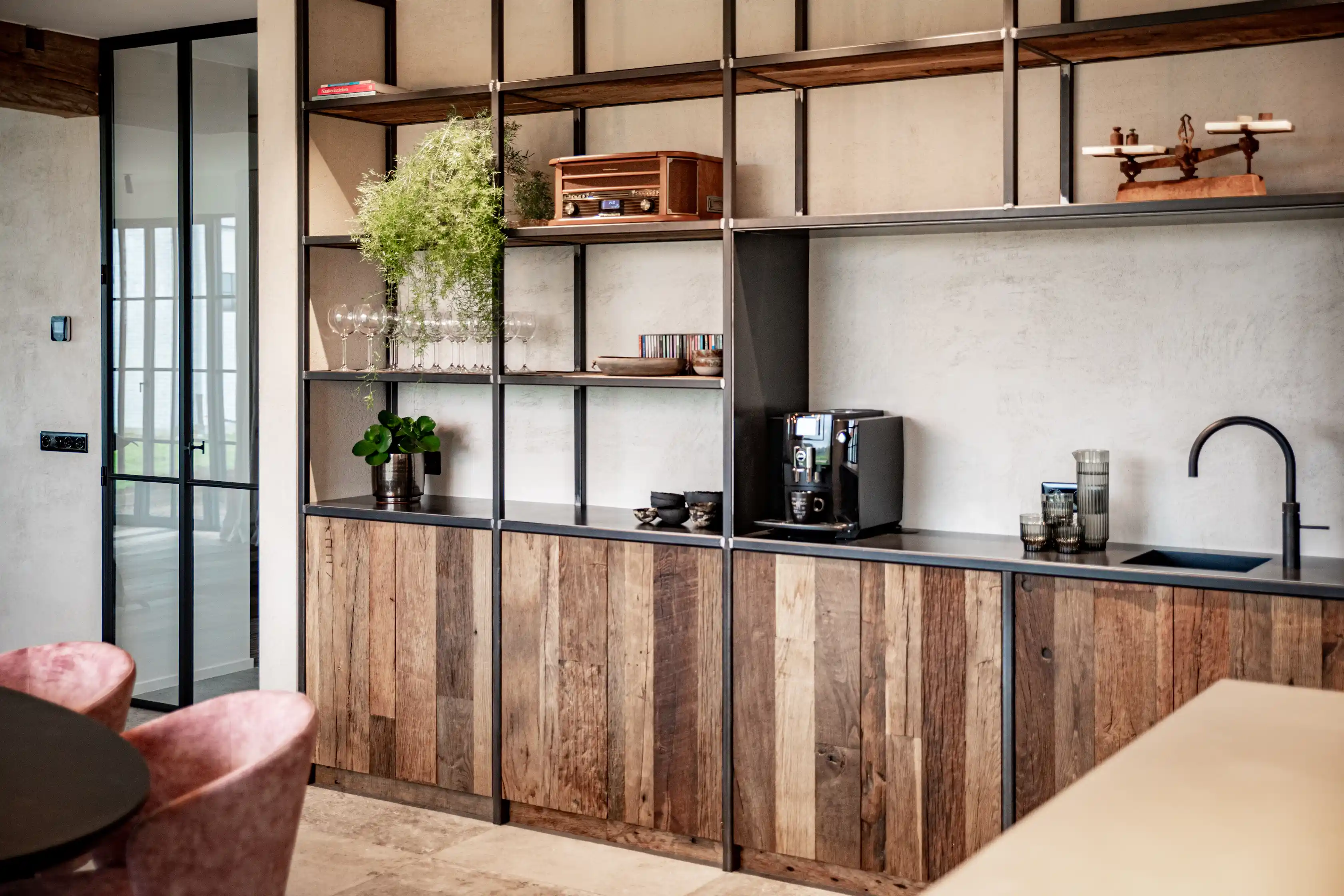 Kitchen interior with reclaimed wood plywood cabinets and natural aged wood textures