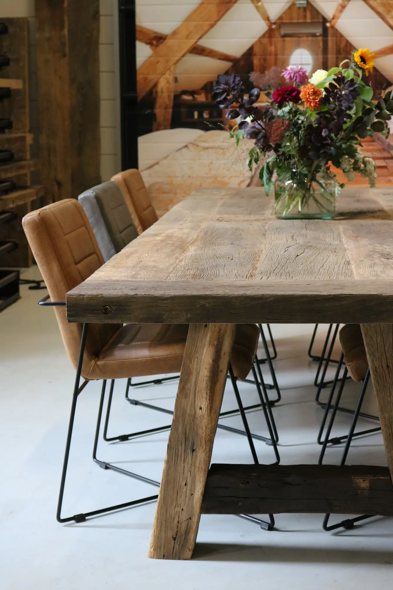 Premium oak dining table with warm wood tones and natural grain patterns.