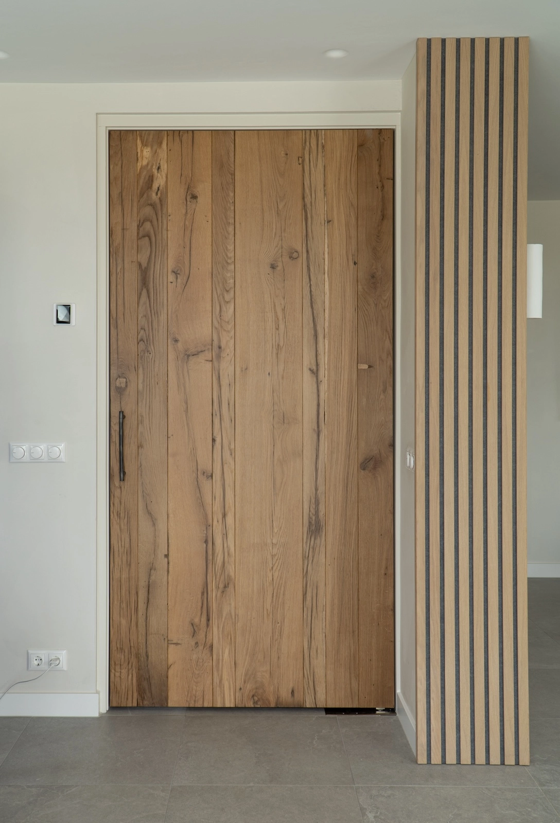 Oak door with natural imperfections and warm tones