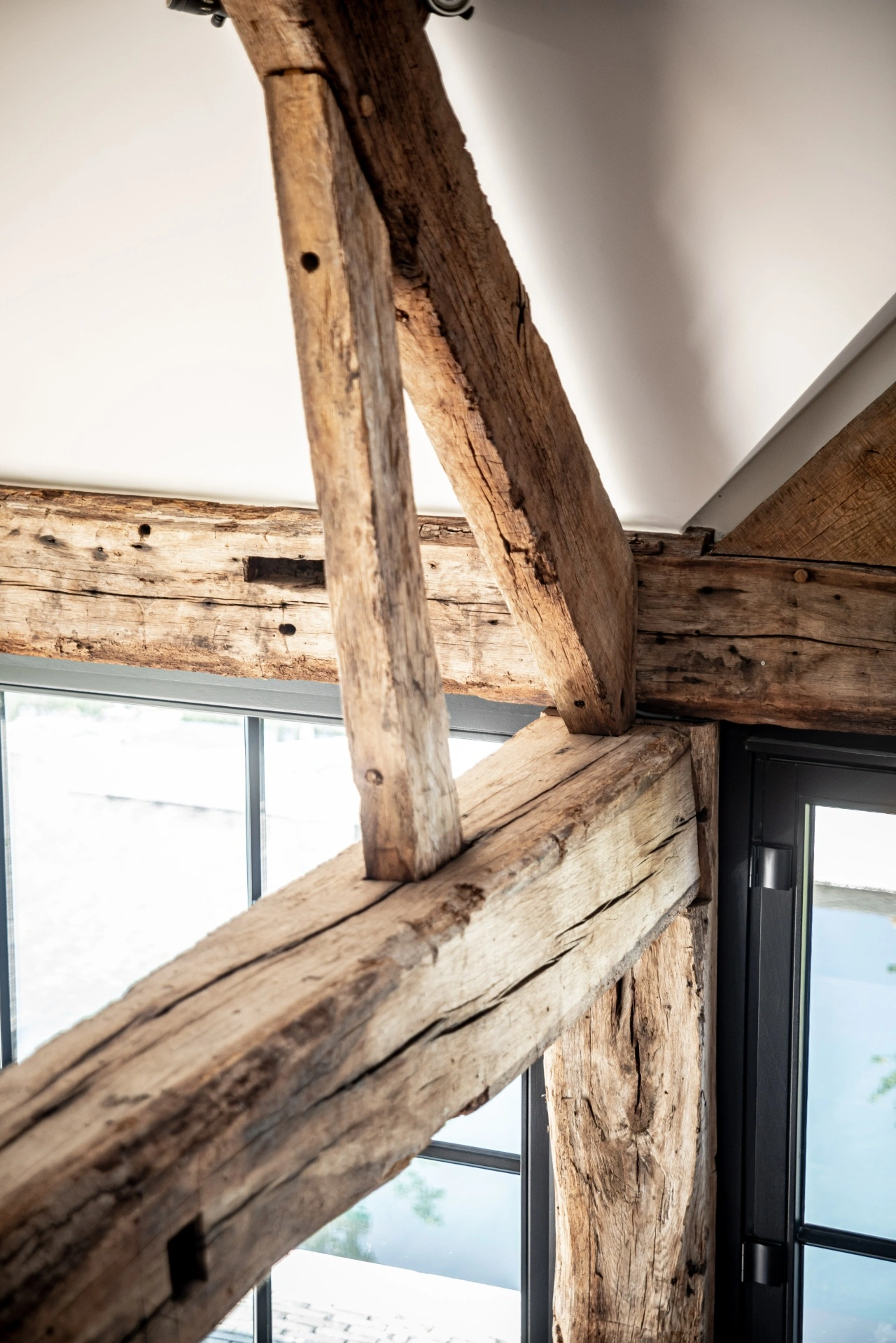 Solid oak beams with visible grain and rustic texture