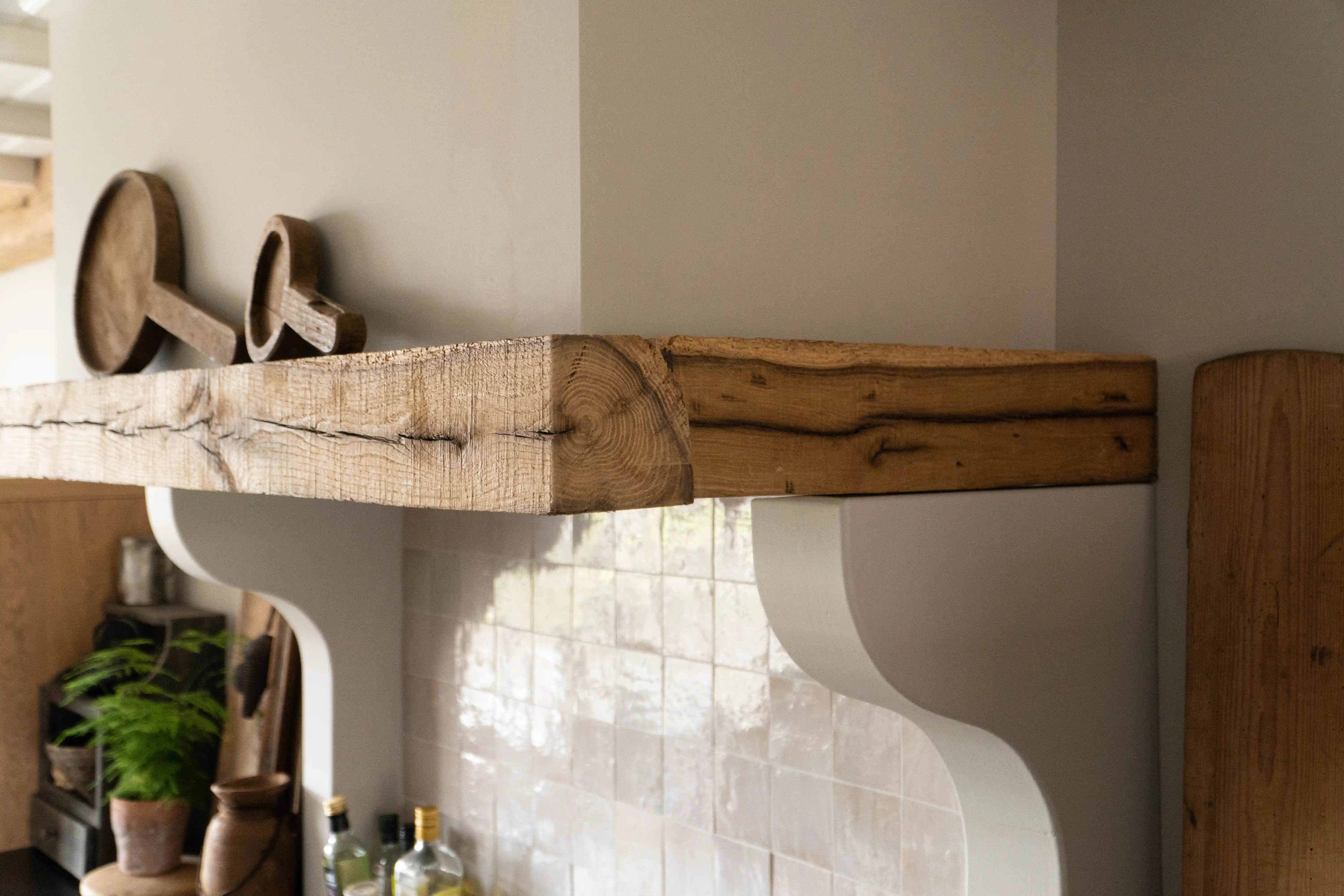 Reclaimed oak mantelpiece with detailed grain pattern