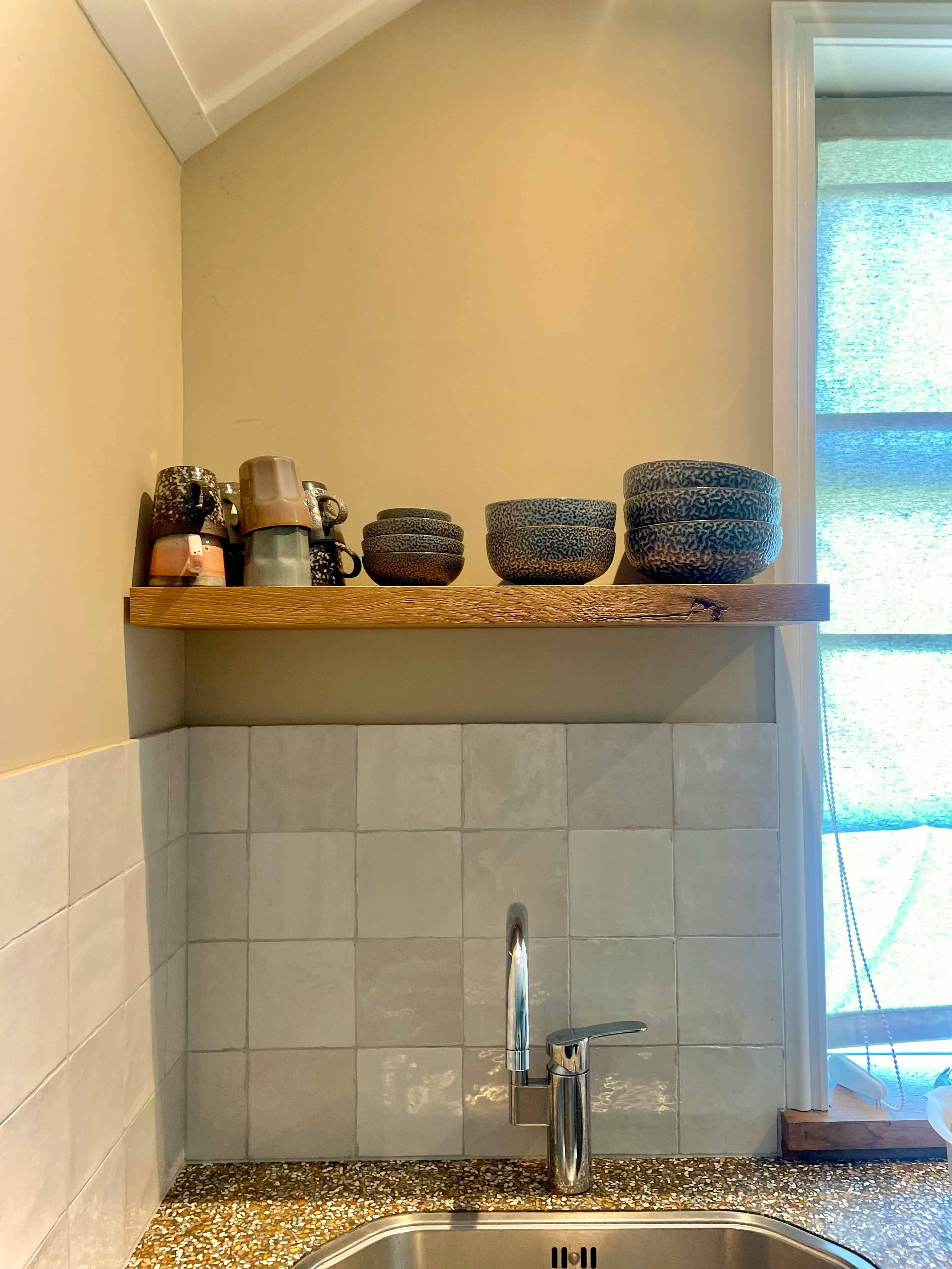 Reclaimed wood floating shelves crafted from recycled timber with natural rustic character