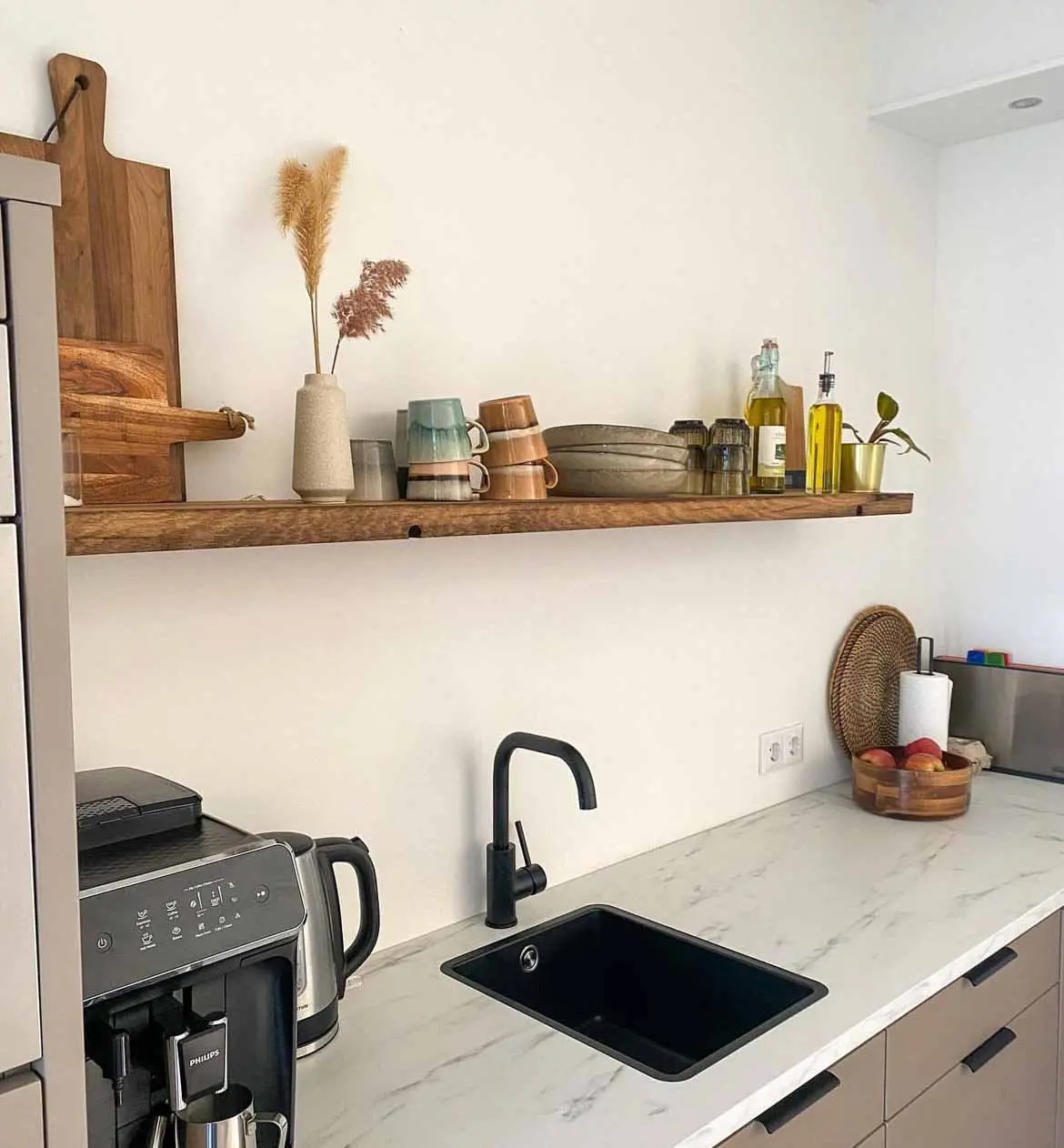 Reclaimed wood shelving with warm natural tones and rustic aged timber details