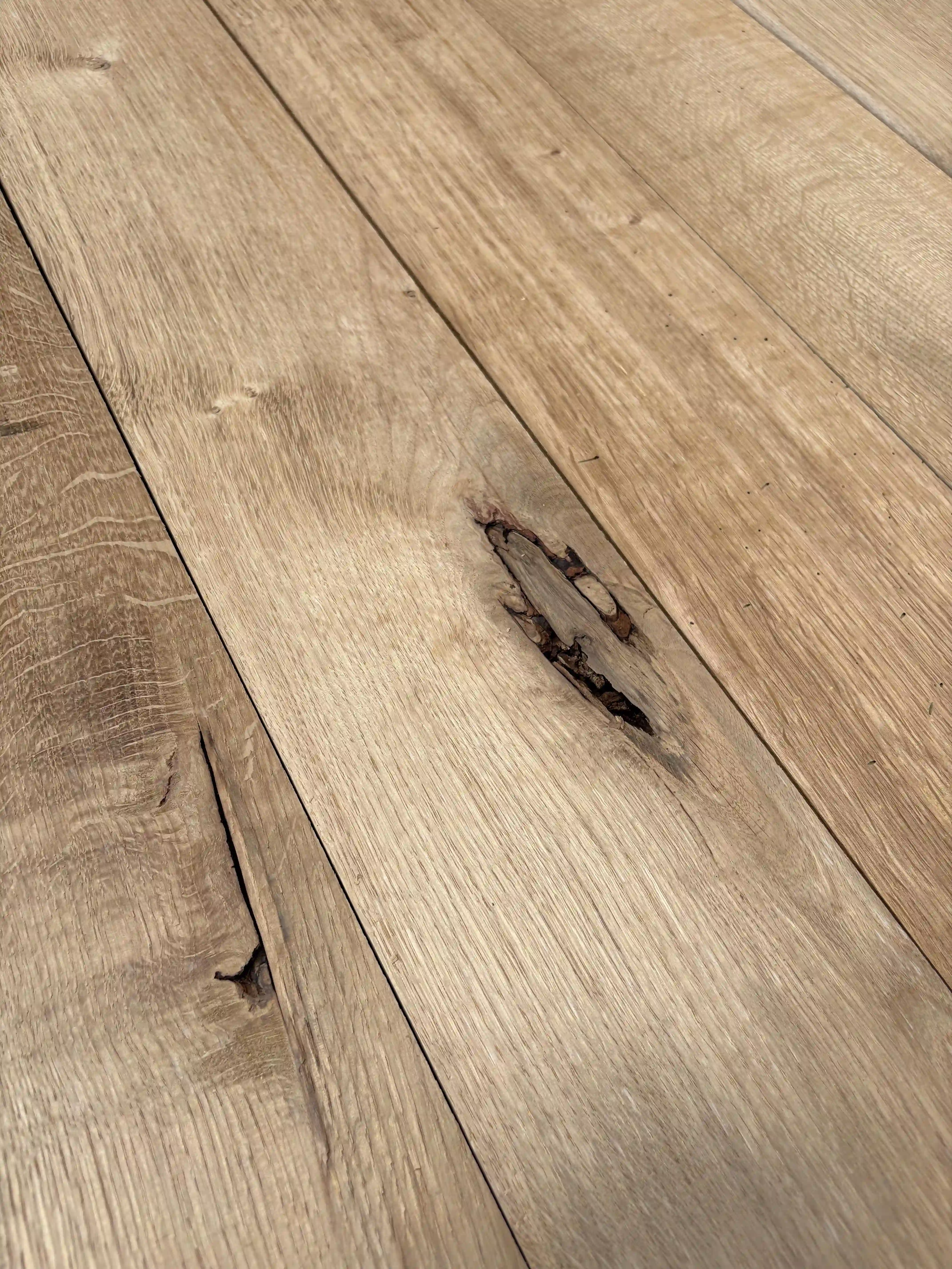 Oak boards with natural cracks knots and detailed grain