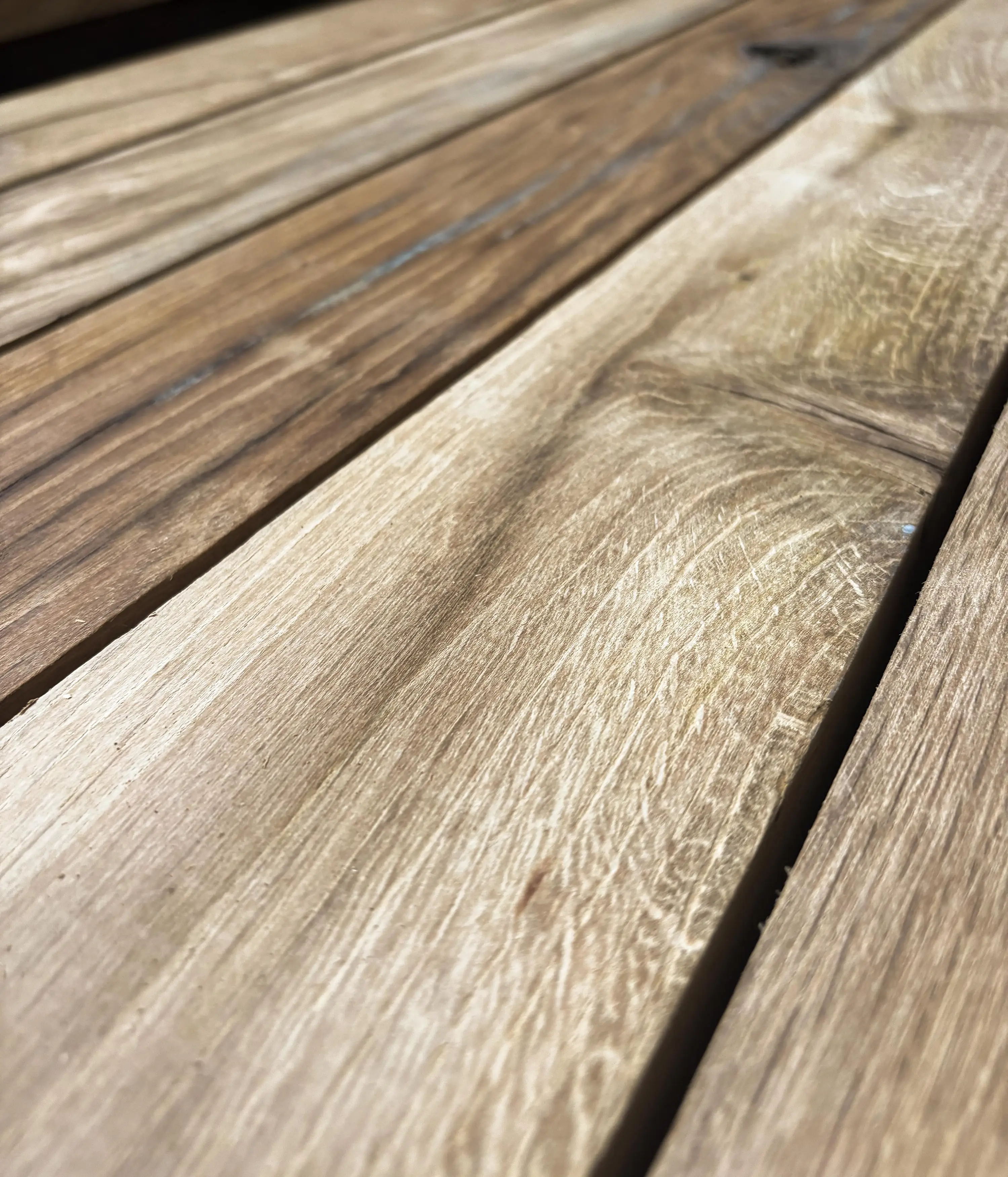 Planed oak beams with smooth surface and visible grain