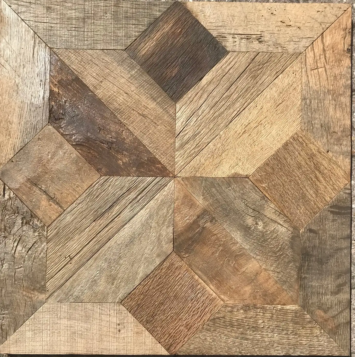 Reclaimed oak parquet flooring crafted from old oak timber with authentic weathered textures