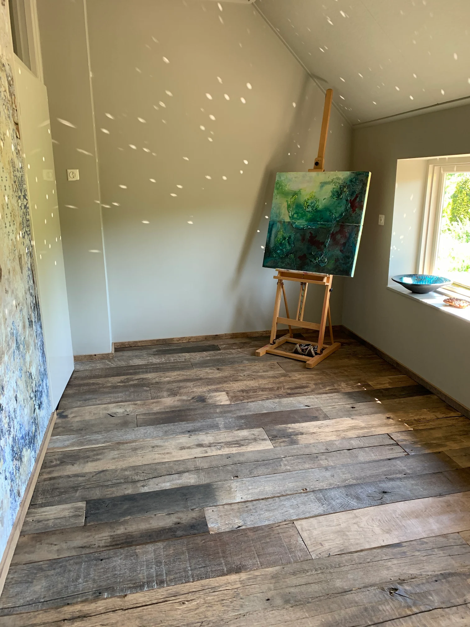 Reclaimed oak wooden floor suitable for modern and rustic interiors with timeless natural beauty