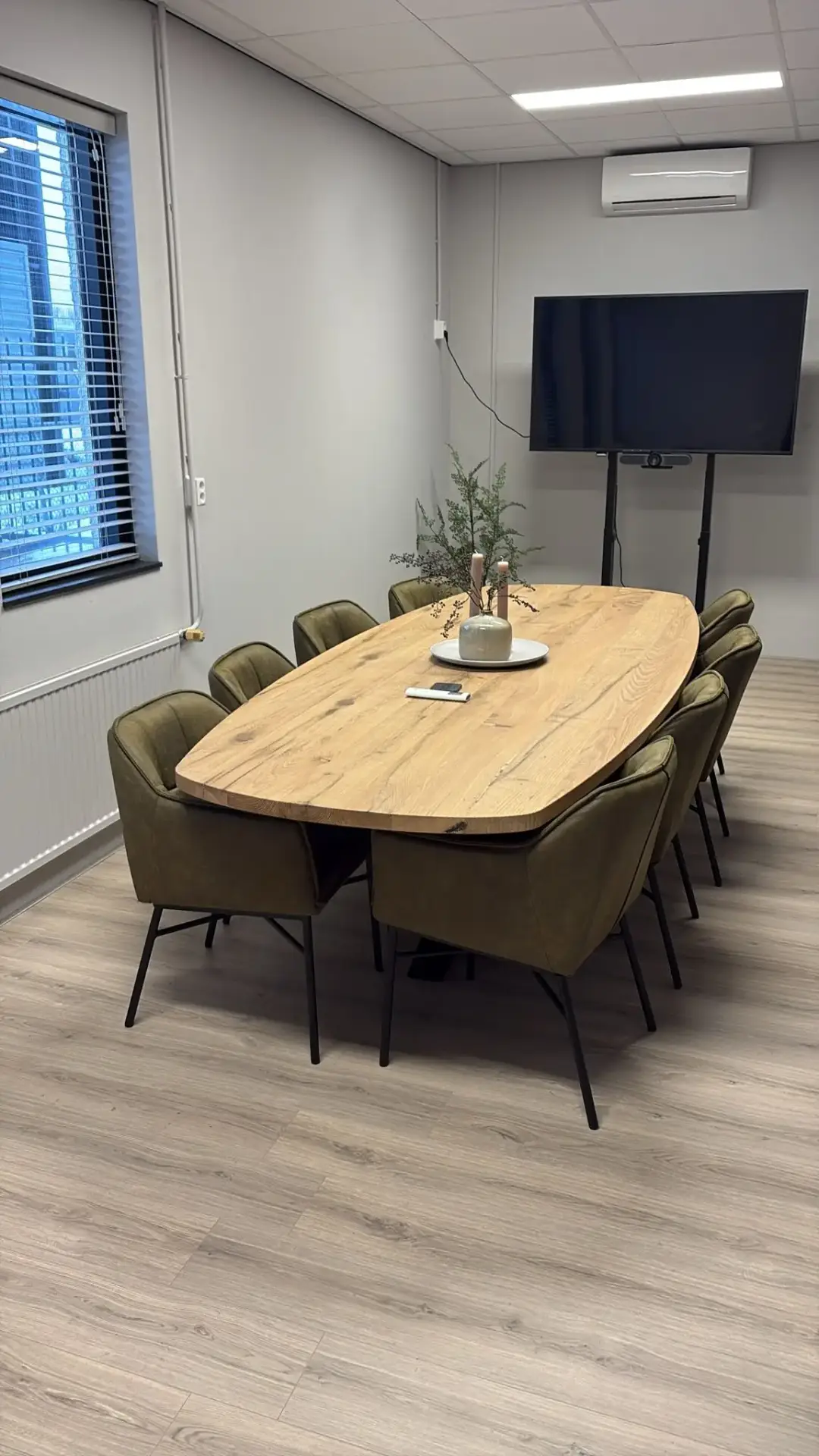 Historic reclaimed oak dining table with solid timber construction.