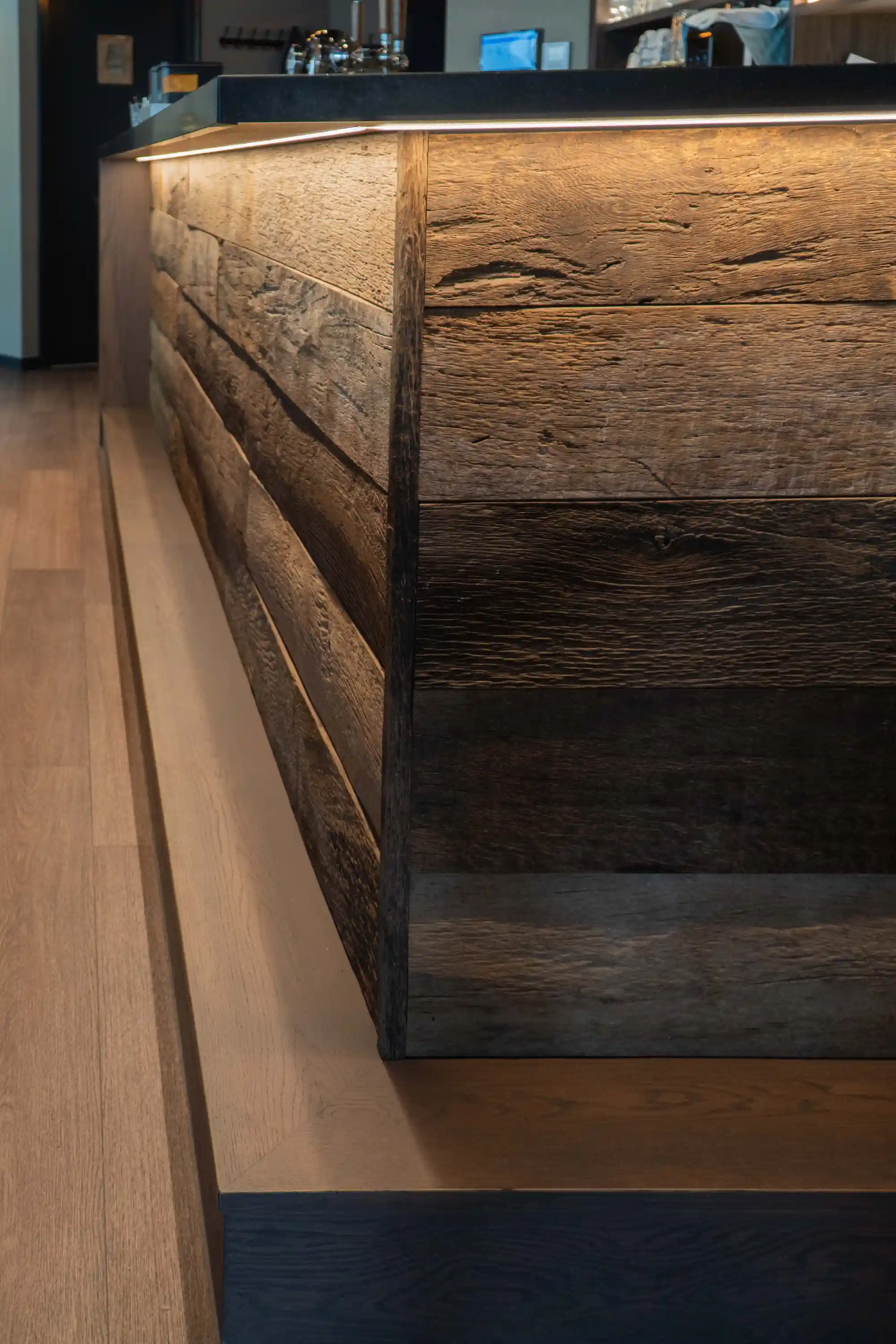 Detail of handcrafted reclaimed oak wall panels.
