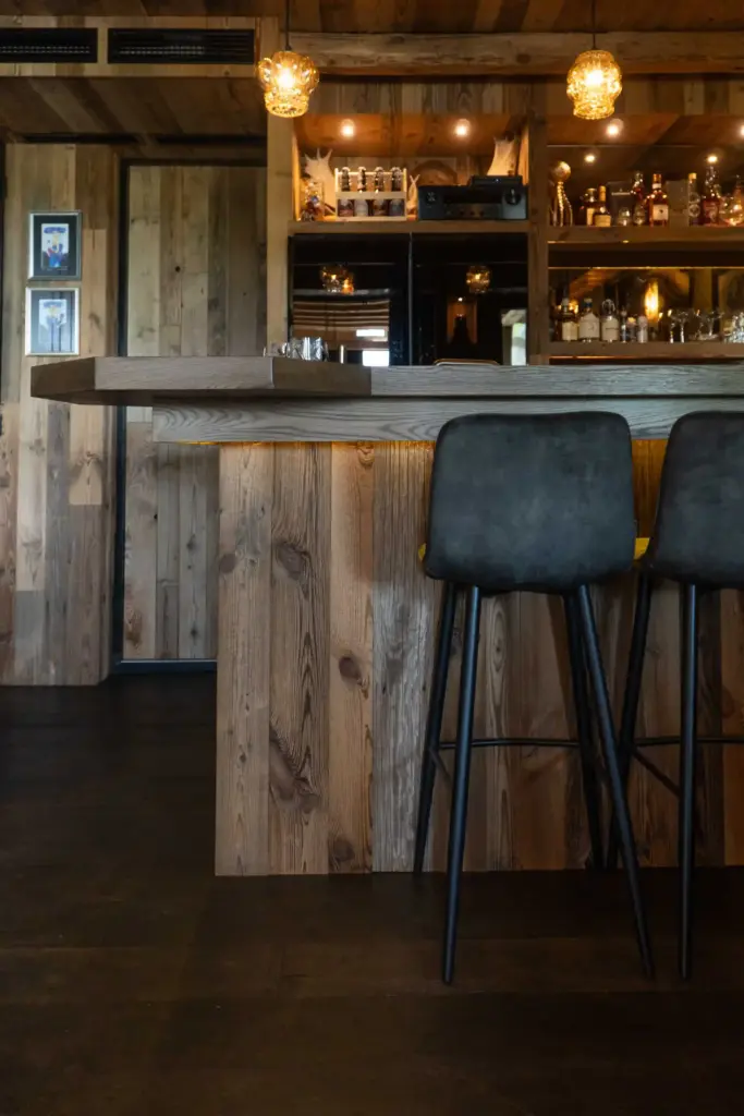 Natural reclaimed pine textures in a cozy interior.