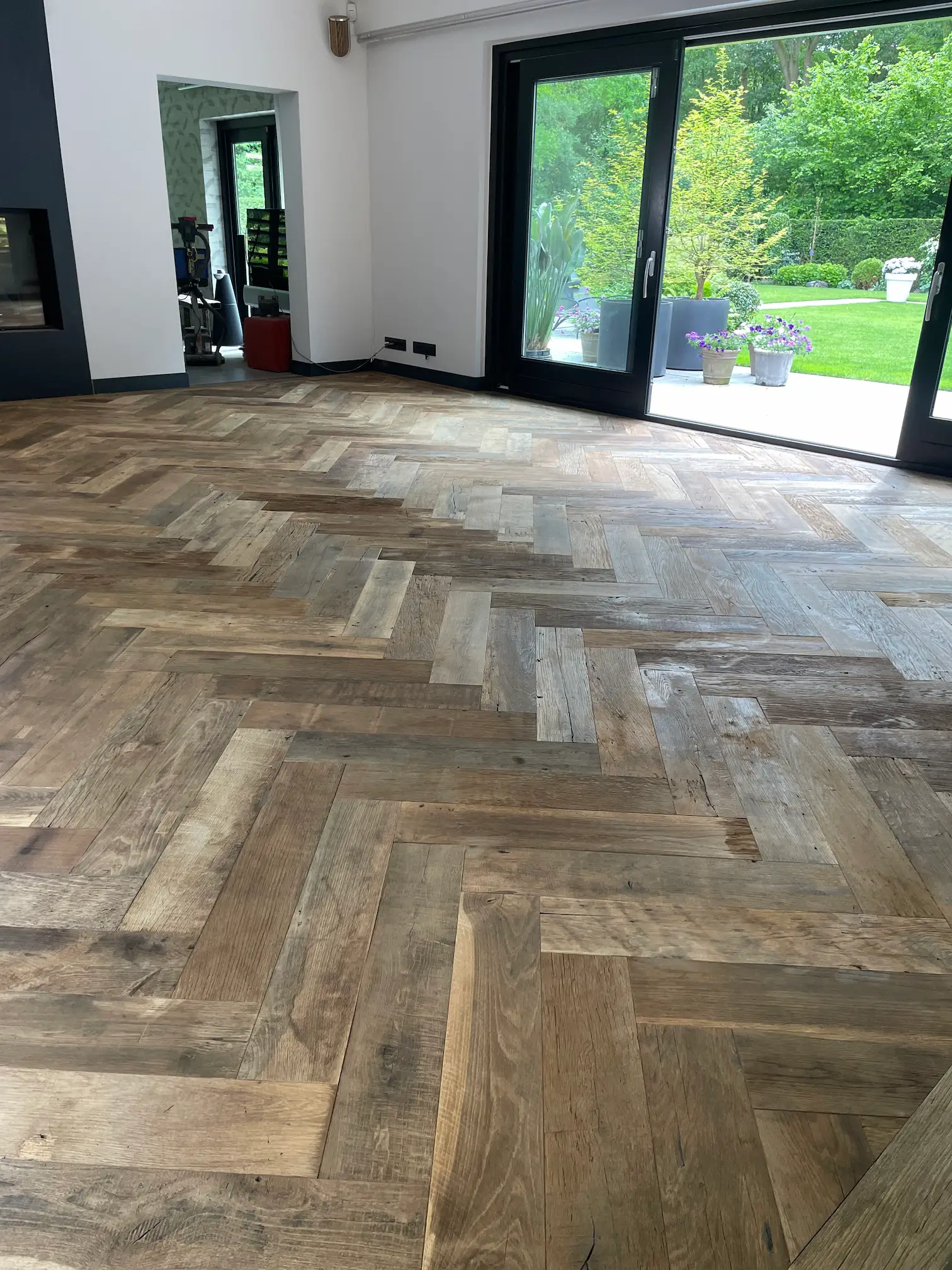 Reclaimed oak herringbone floor in a home in Zeeland with a warm and characterful appearance